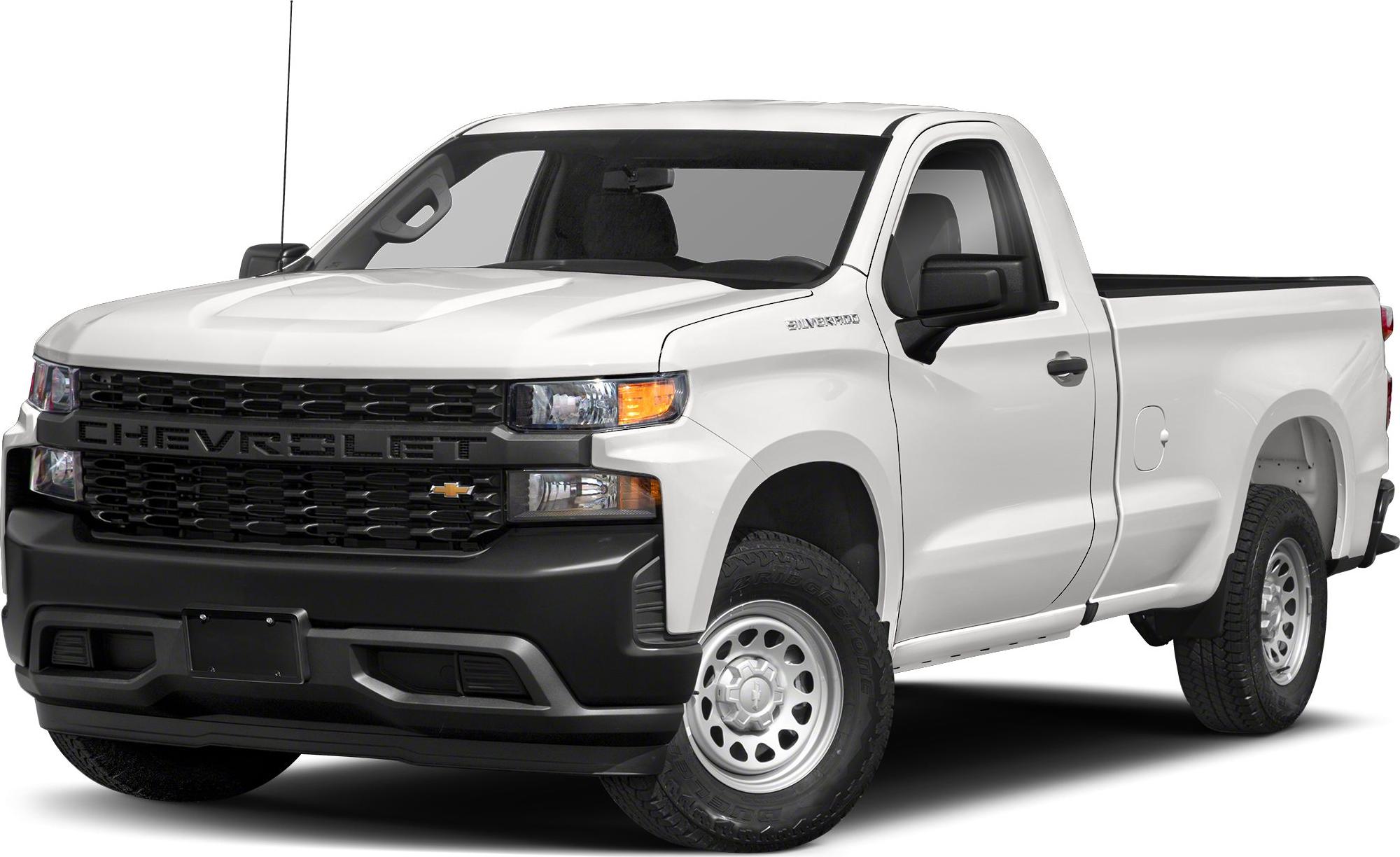 Front-side view of pickup with bold grille and extended cargo bed