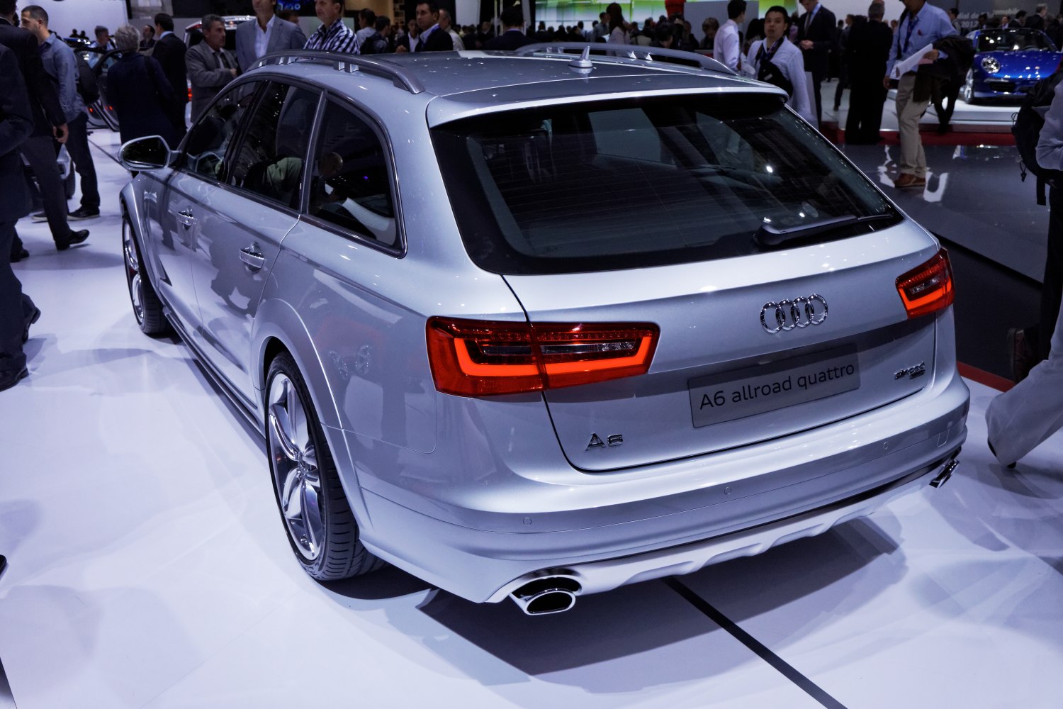 Rear view of an SUV-style station wagon with LED taillights and dual exhaust.