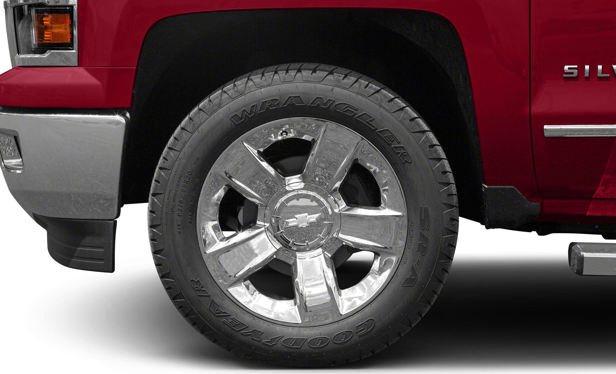 Polished chrome alloy wheel with Goodyear Wrangler tire tread