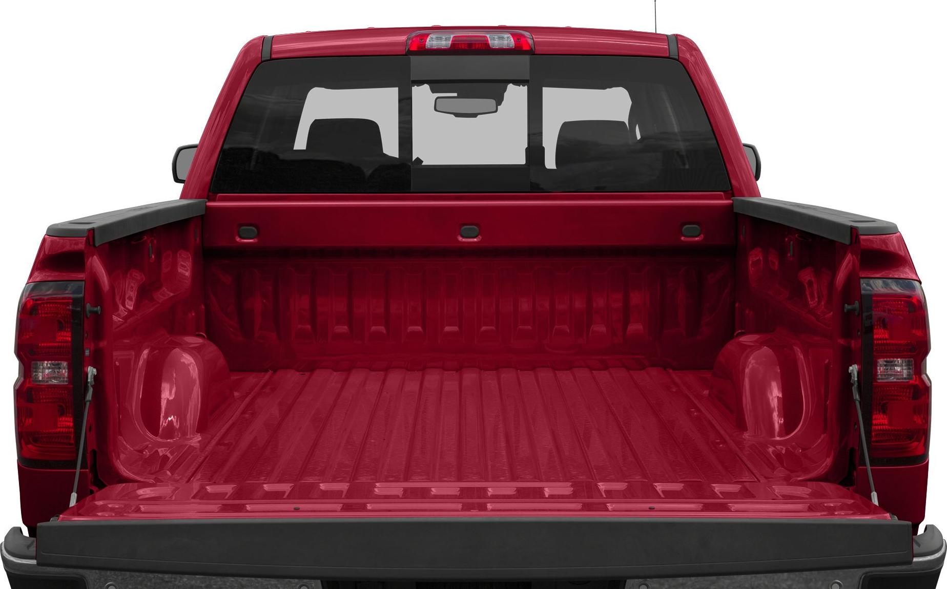 Open red pickup truck bed with tailgate lowered