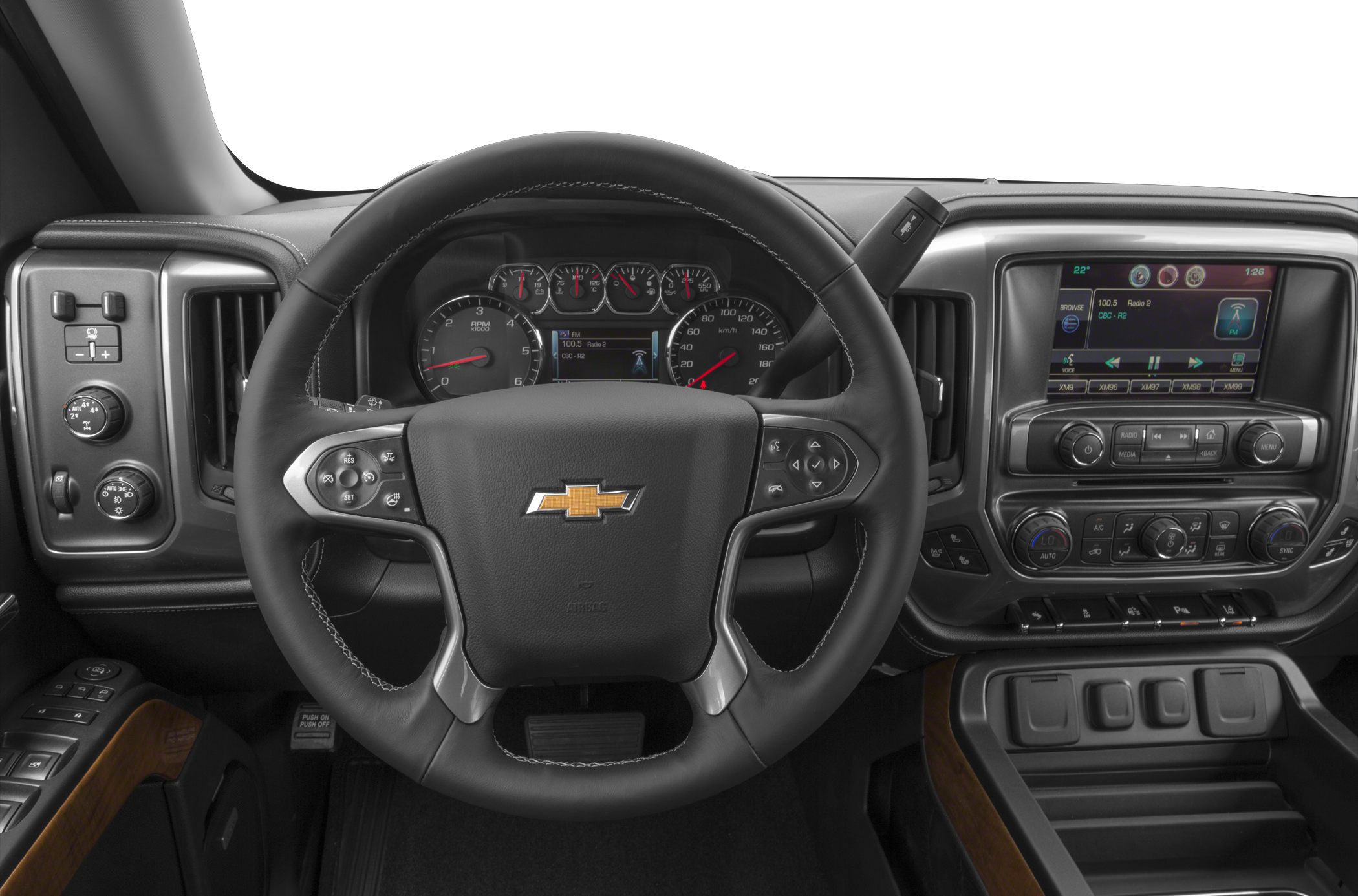 Steering wheel and dashboard with digital instrument cluster and infotainment controls