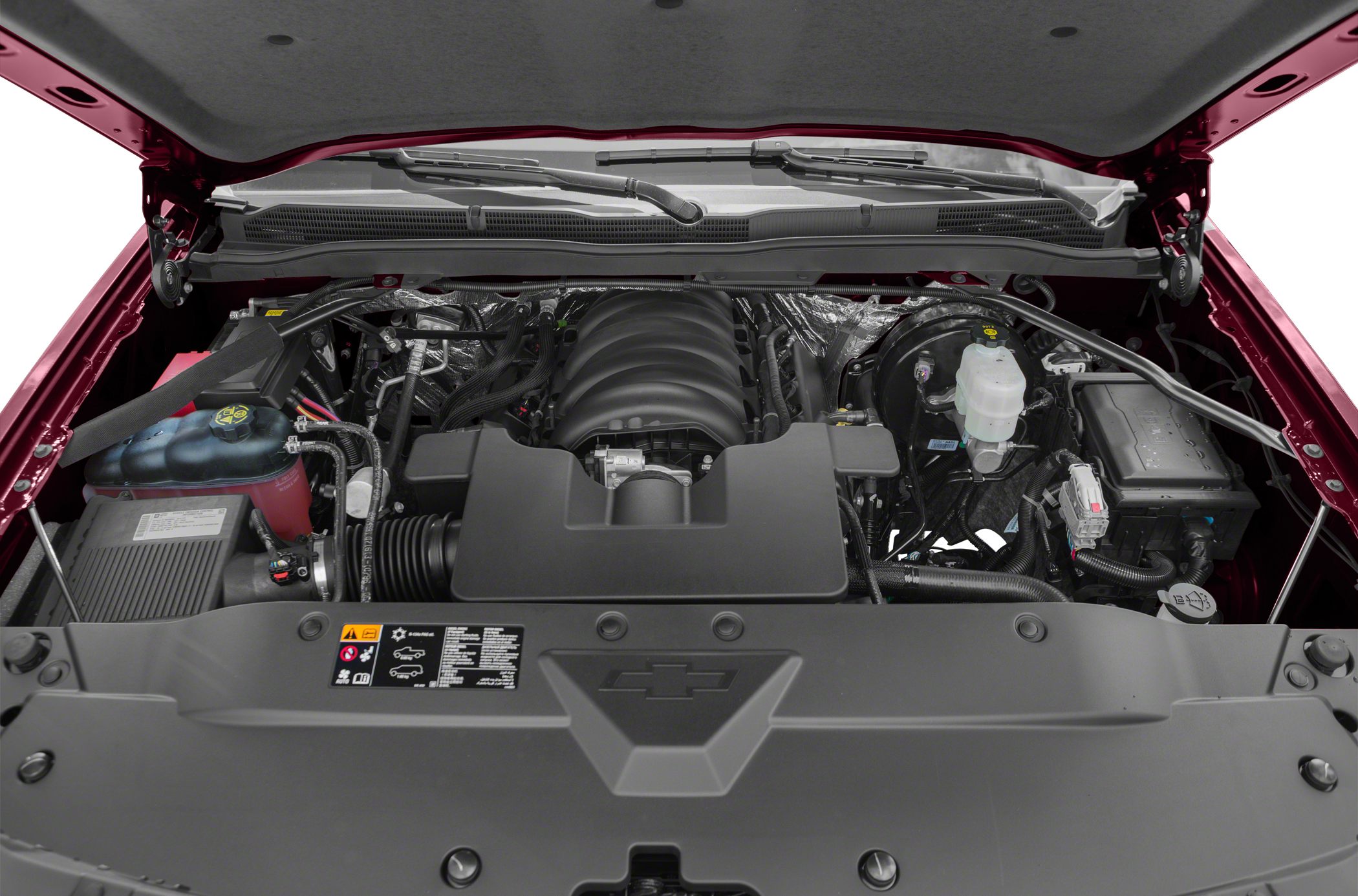 Open engine bay with visible V8 engine and components