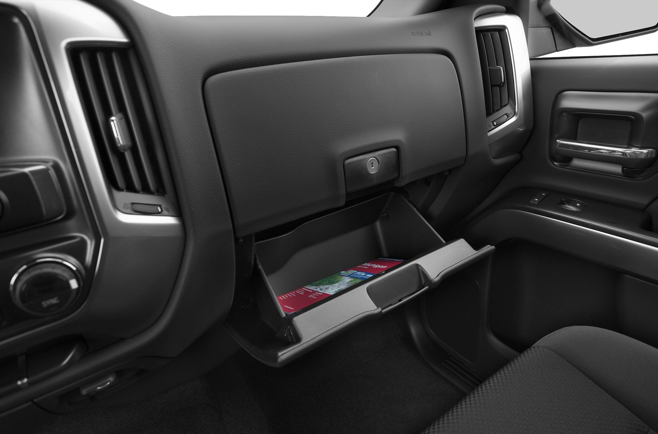 Open glove box and dashboard details in truck interior
