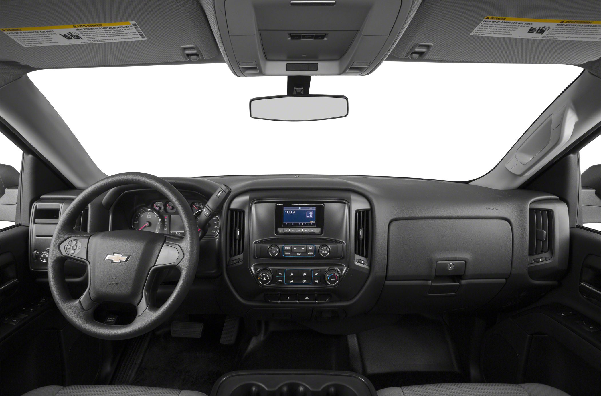 Dashboard, steering wheel, and central console of a truck interior
