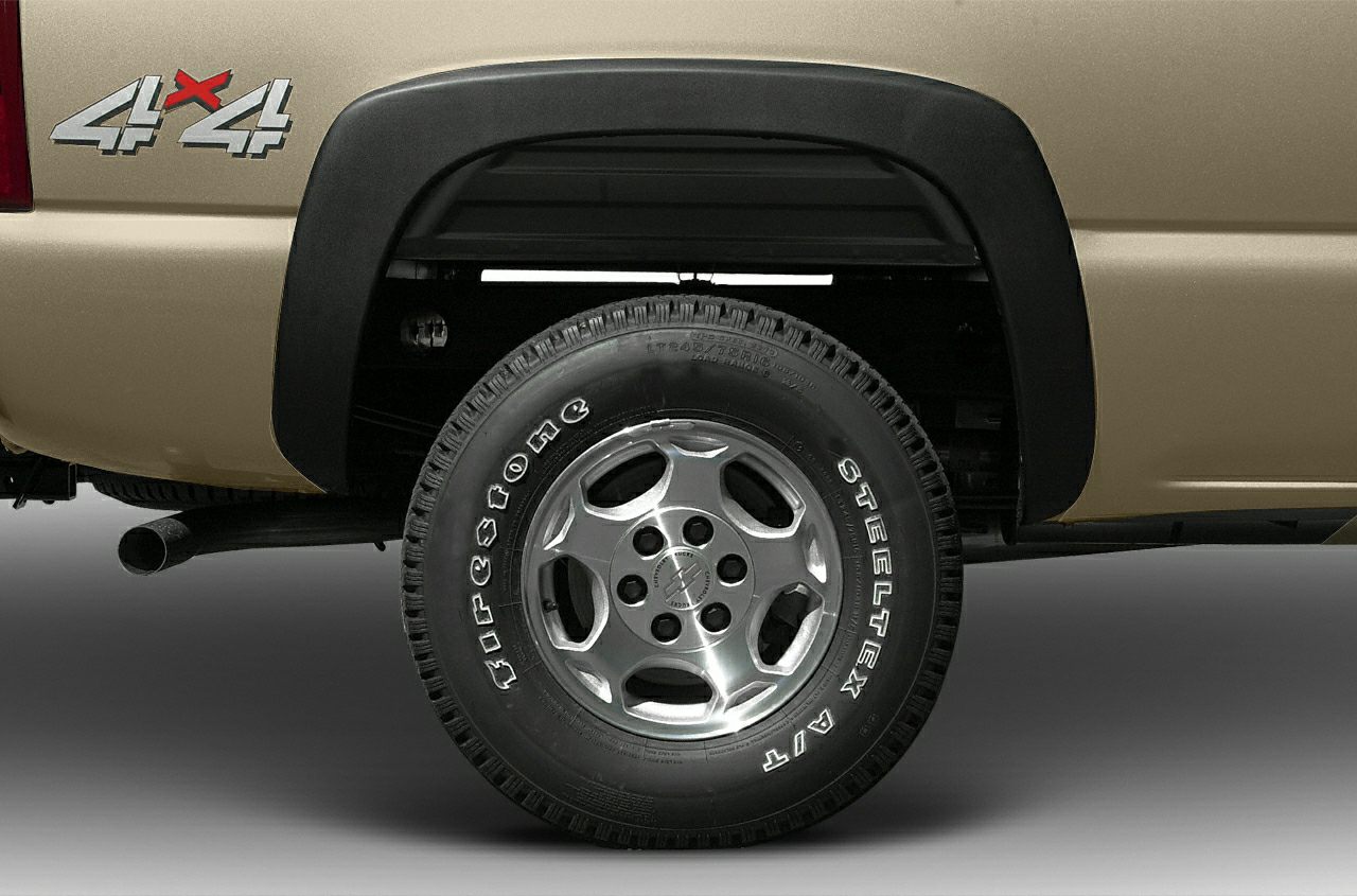 4x4 rear wheel with Firestone Steeltex A/T tire and black fender