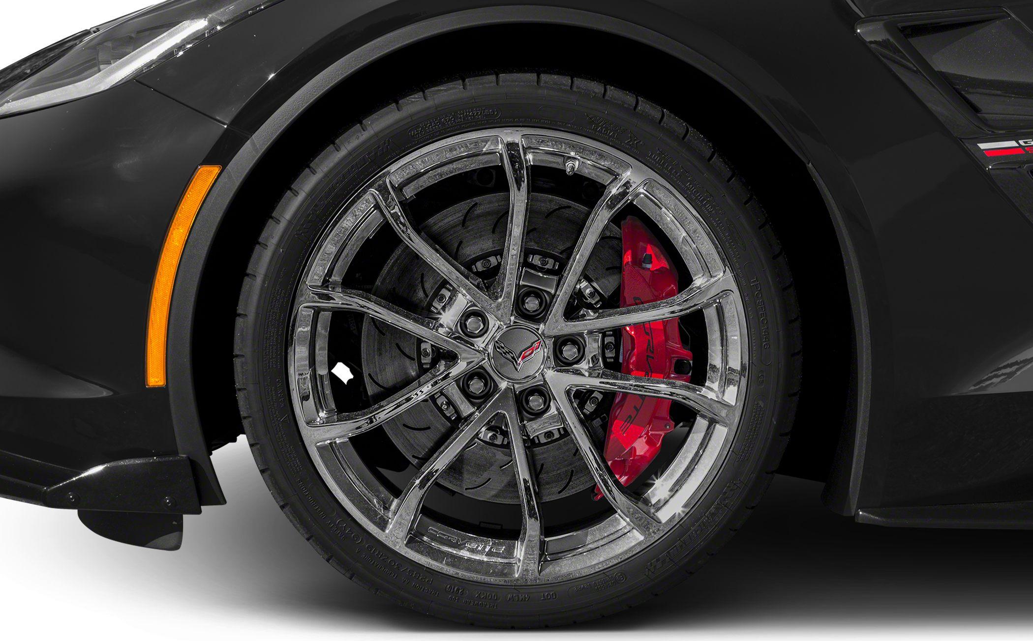 Multi-spoke alloy wheel and red high-performance brake caliper.