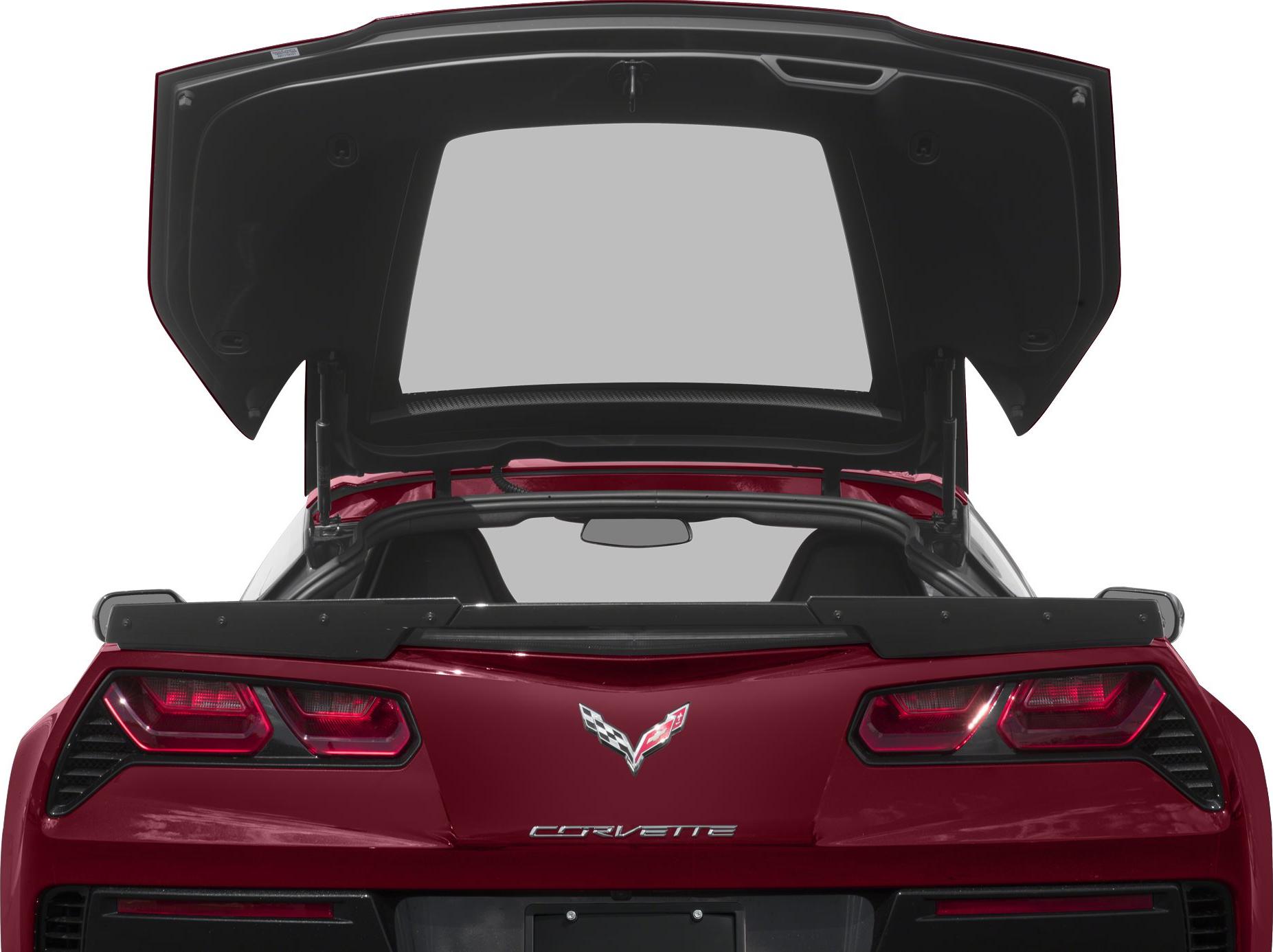 Rear view with open trunk, distinctive taillights, and rear spoiler