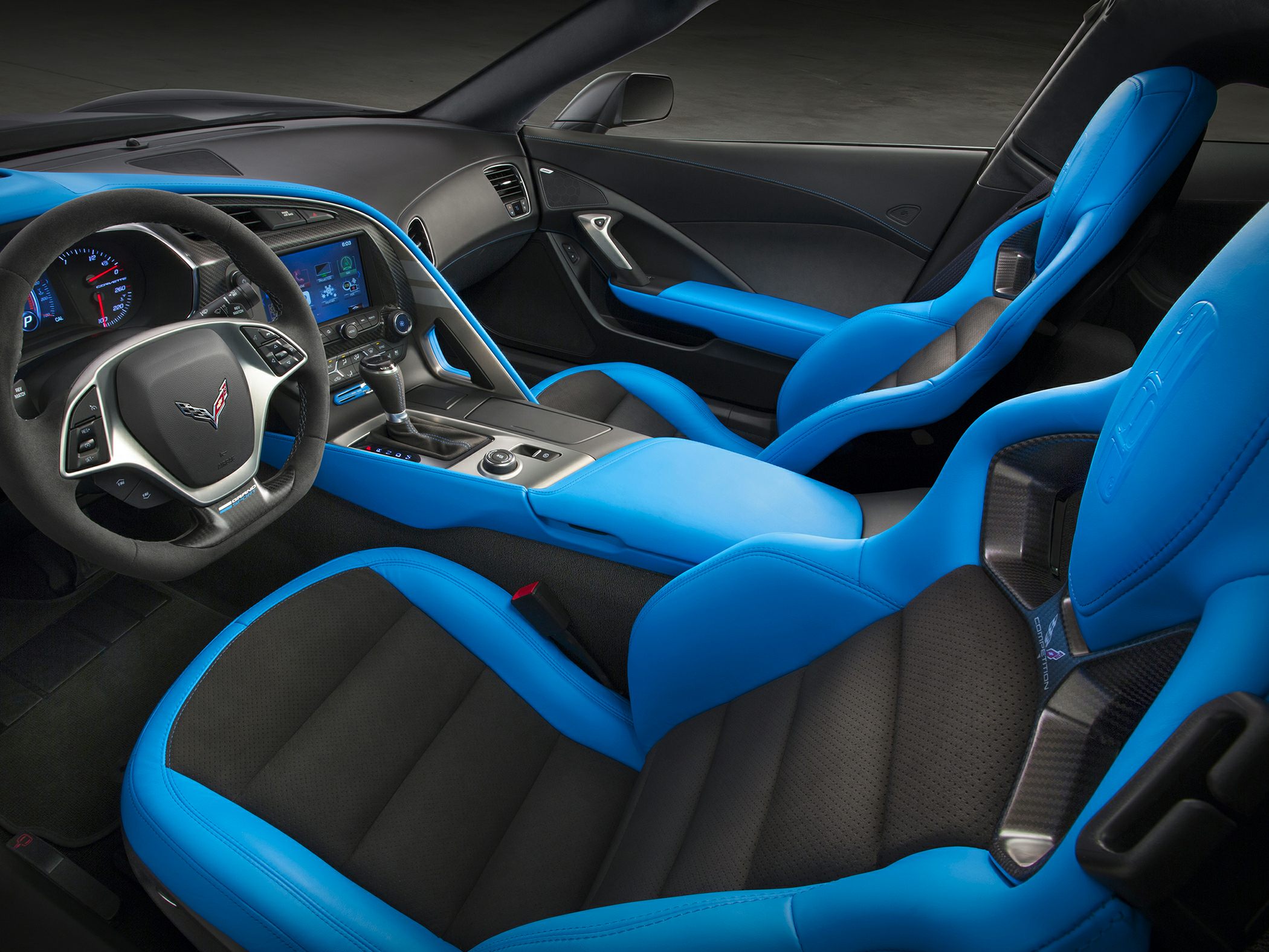 Blue and black sport seats with modern dashboard and steering wheel