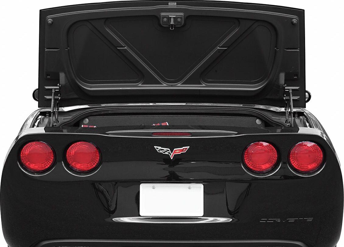 Rear view of Corvette convertible with open trunk and circular taillights