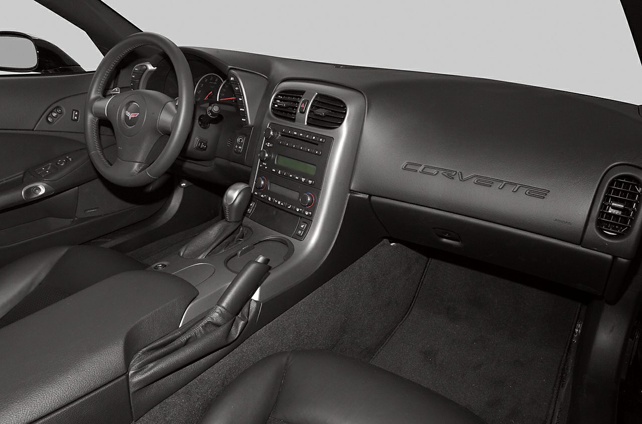 Dashboard, steering wheel, center console of a convertible sports car interior