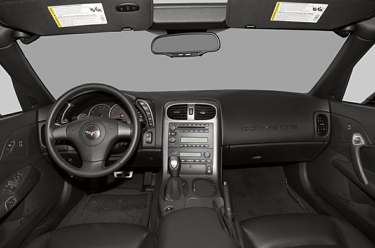 Dashboard and steering wheel interior with center console controls