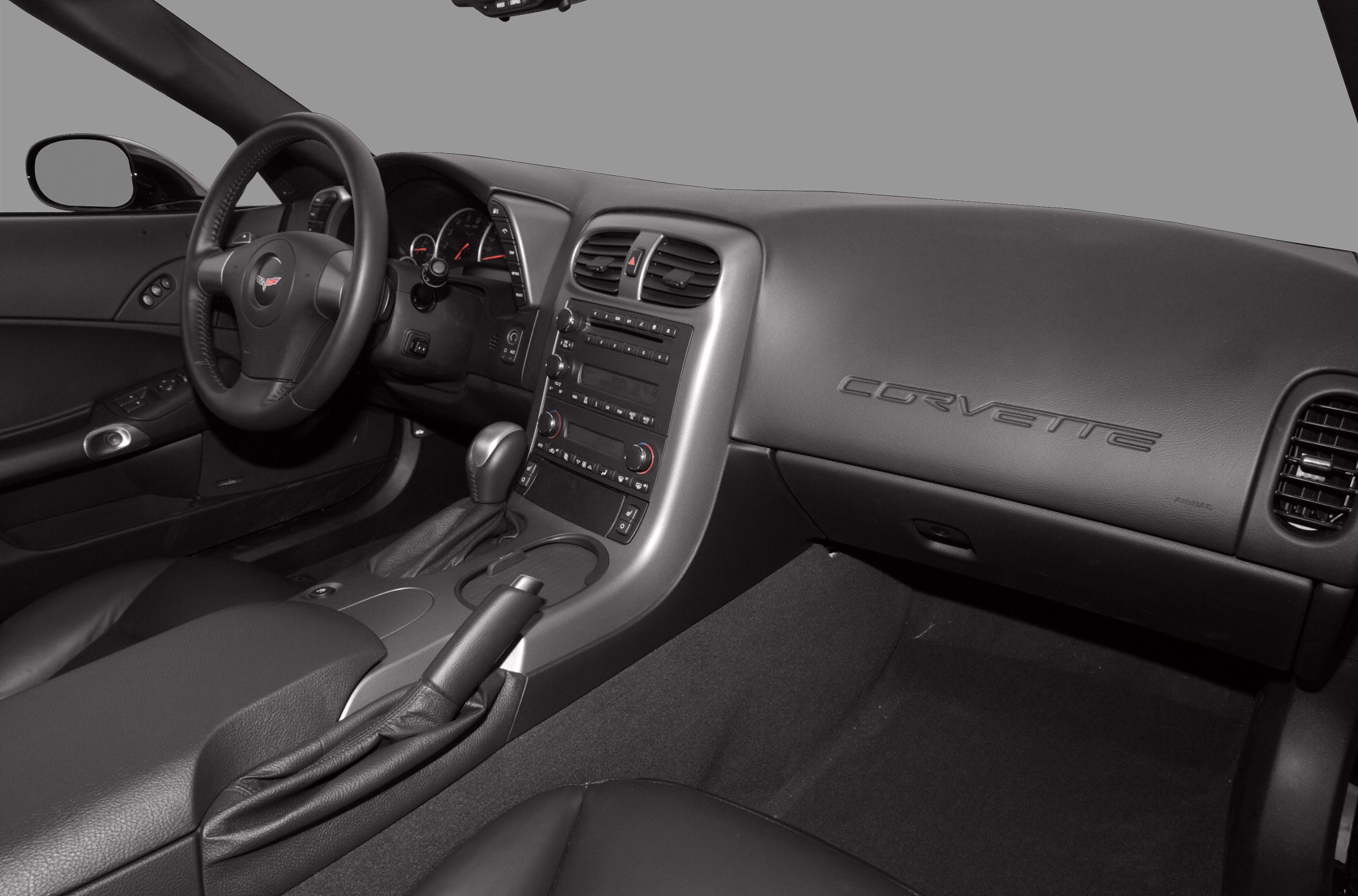Dashboard, steering wheel, center console of a sports coupe interior