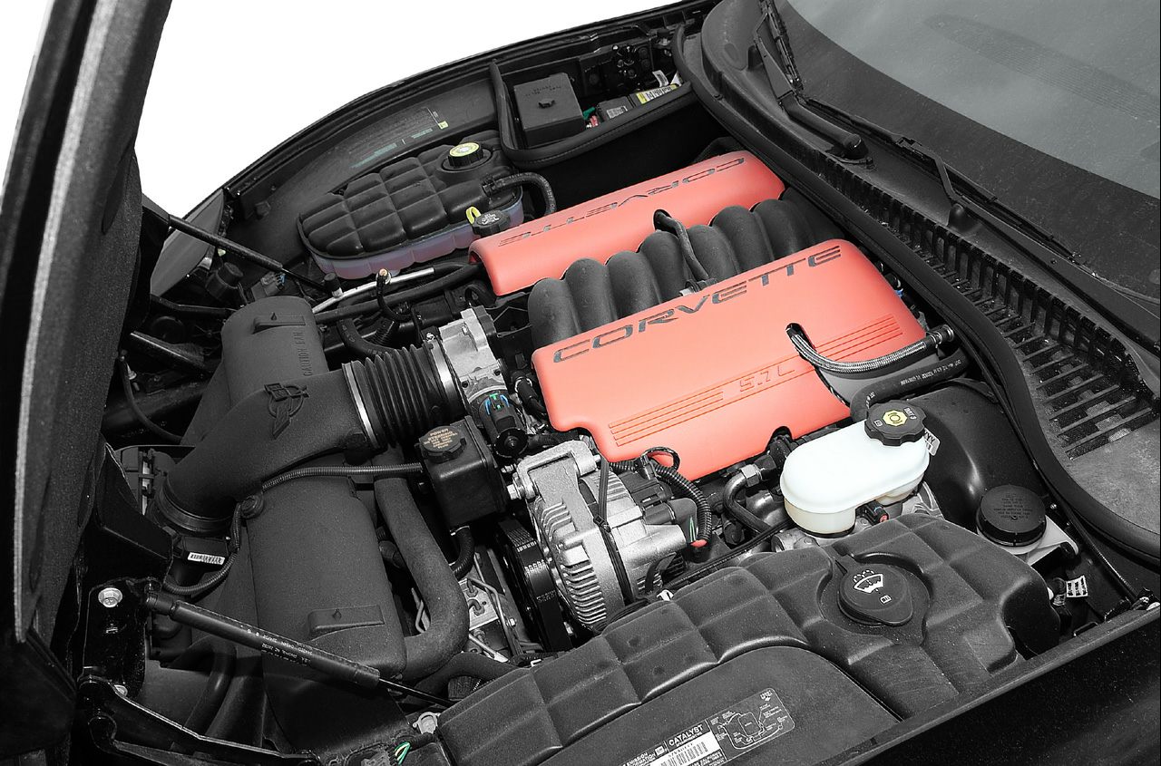 Close-up of Corvette C5 5.7L V8 engine with orange valve covers