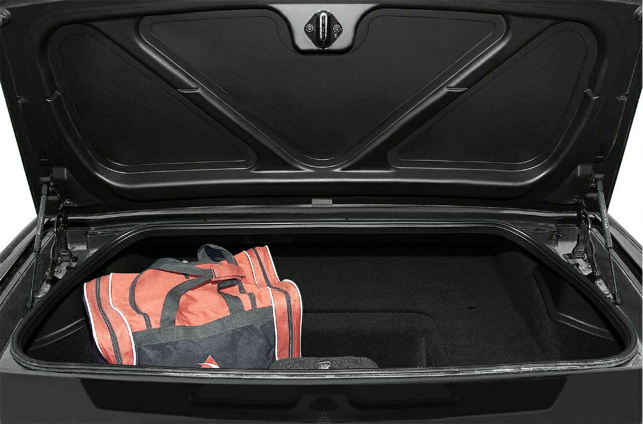 Opened trunk with red sports bag inside