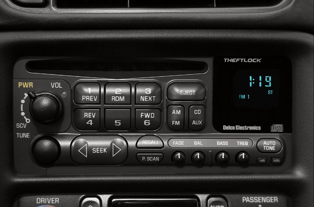 Car stereo system with Theftlock, CD player, and audio tuning knobs