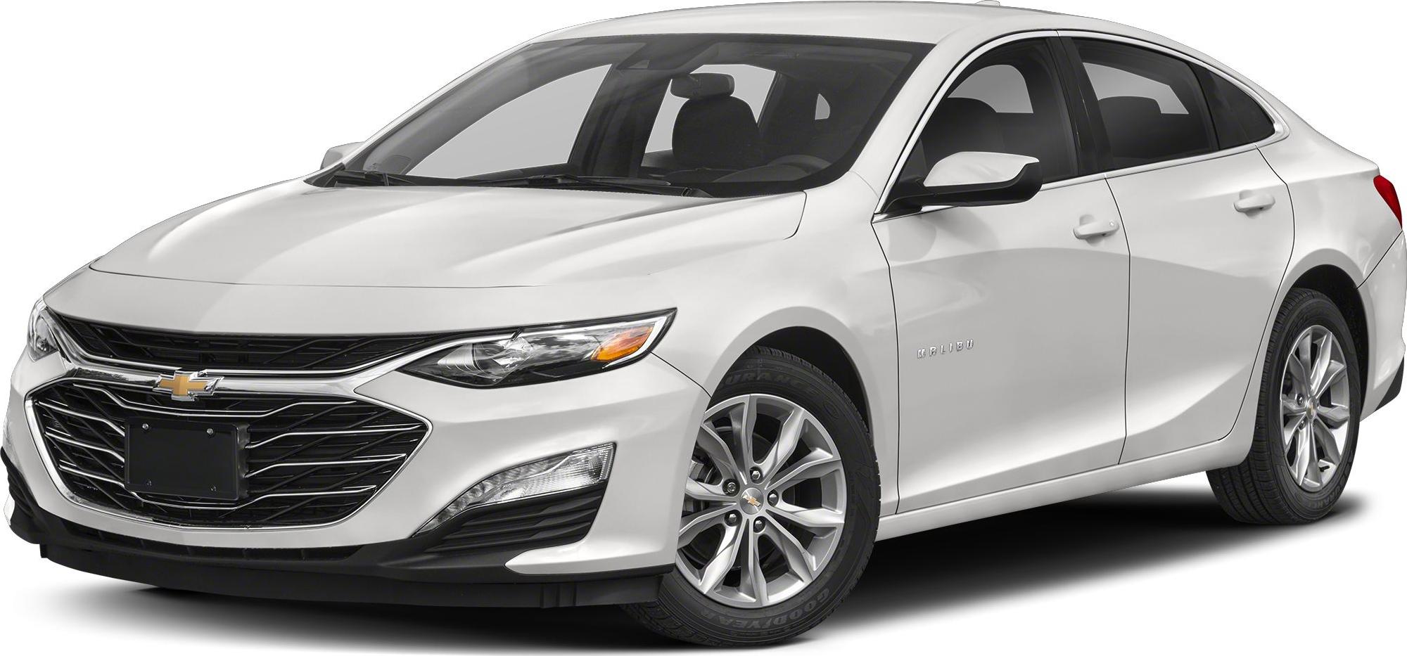 Front grille and sleek headlight design of white sedan