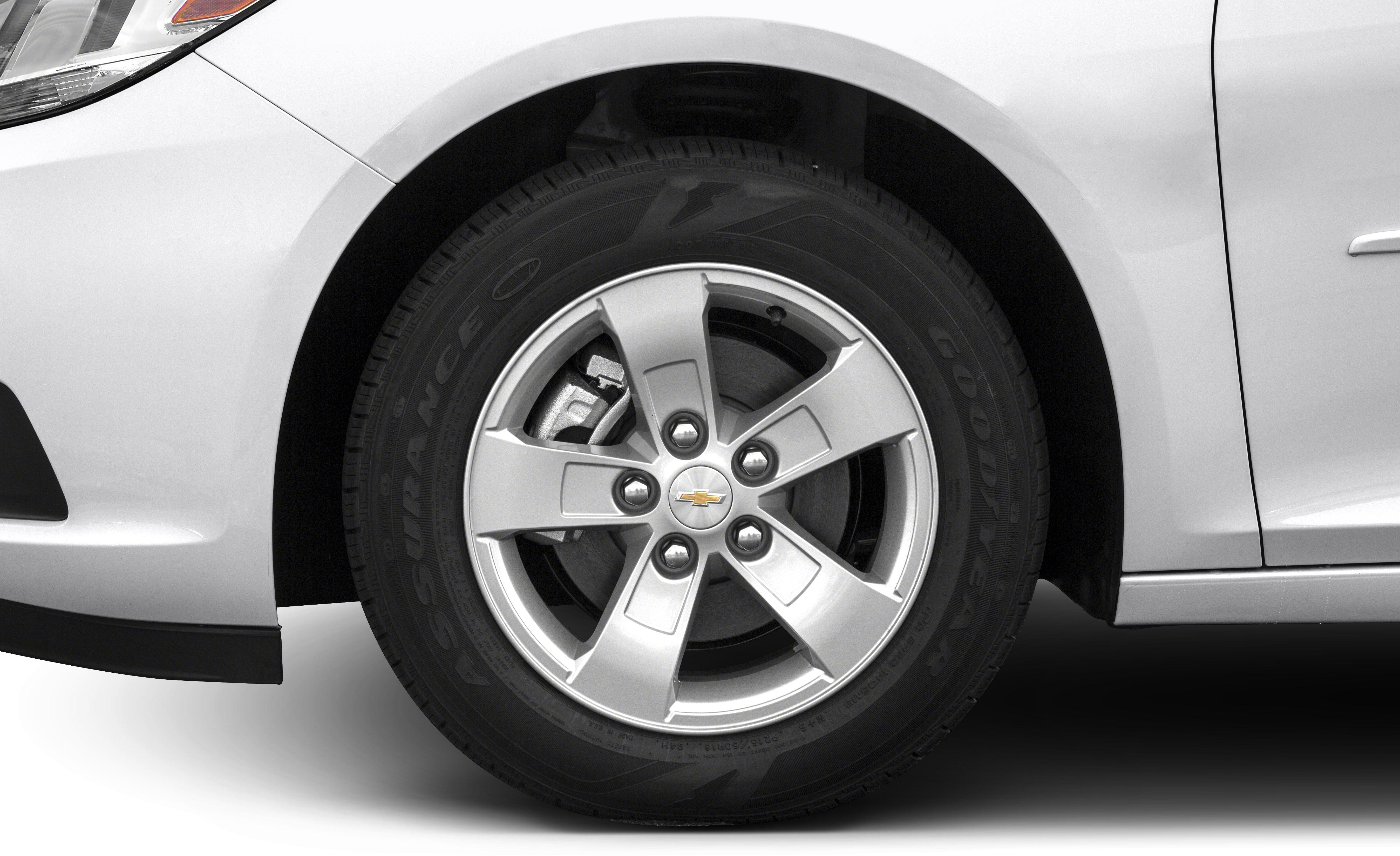Close-up of alloy wheel, tire, and brake disc.