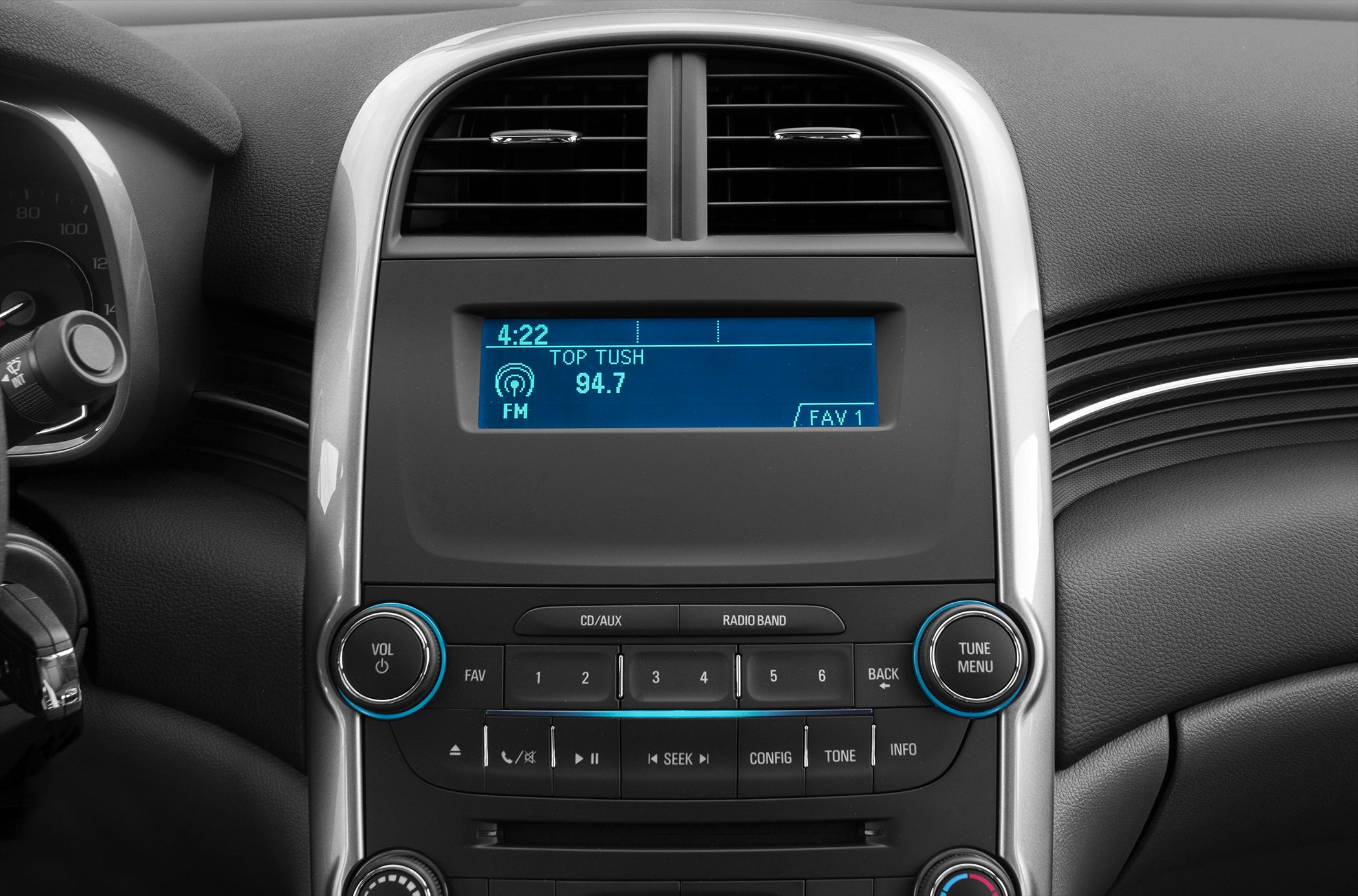 Car infotainment system with radio display and control knobs