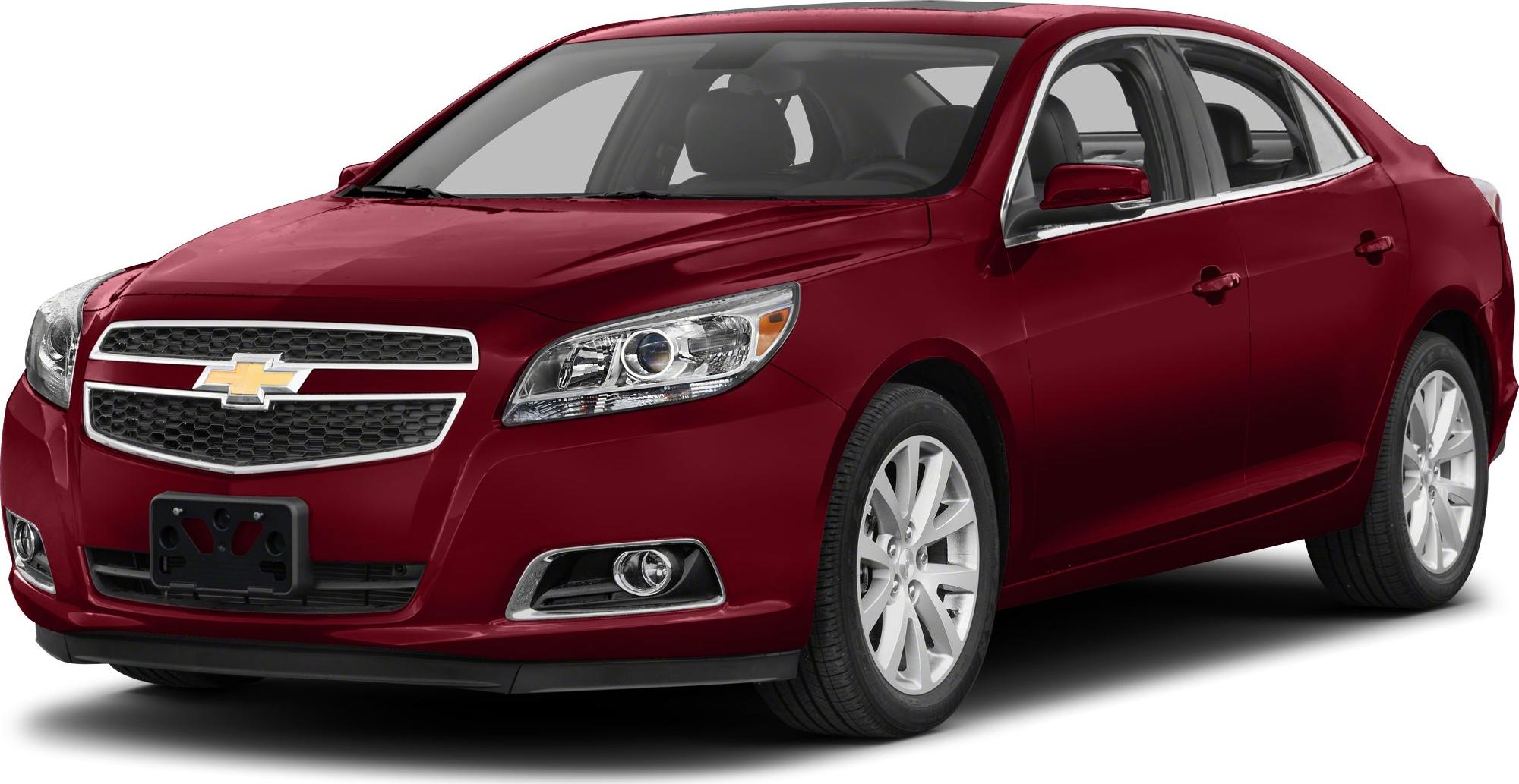 Front view of mid-size sedan with chrome grille and alloy wheels