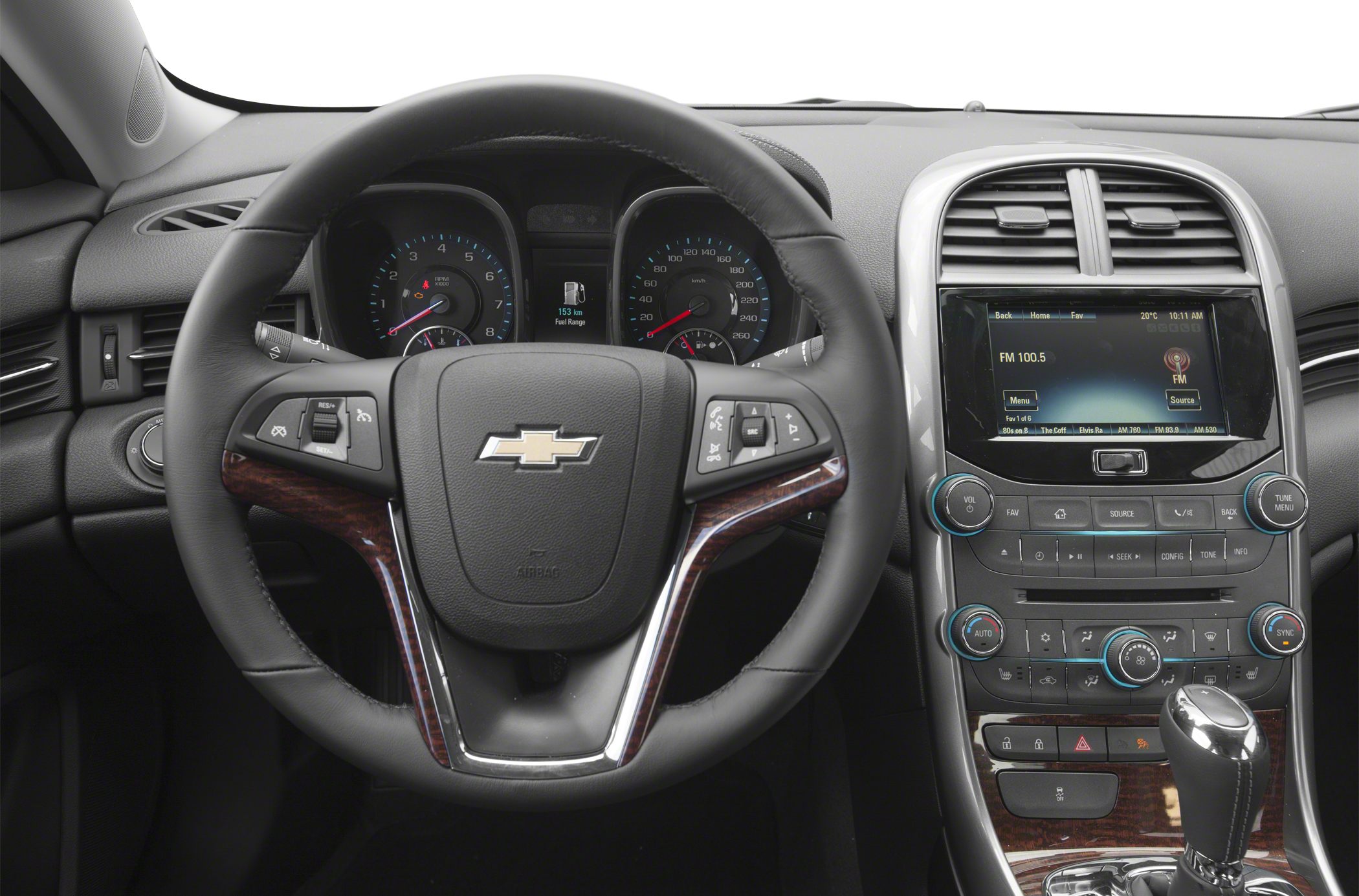 Dashboard and steering wheel with instrument cluster and infotainment system