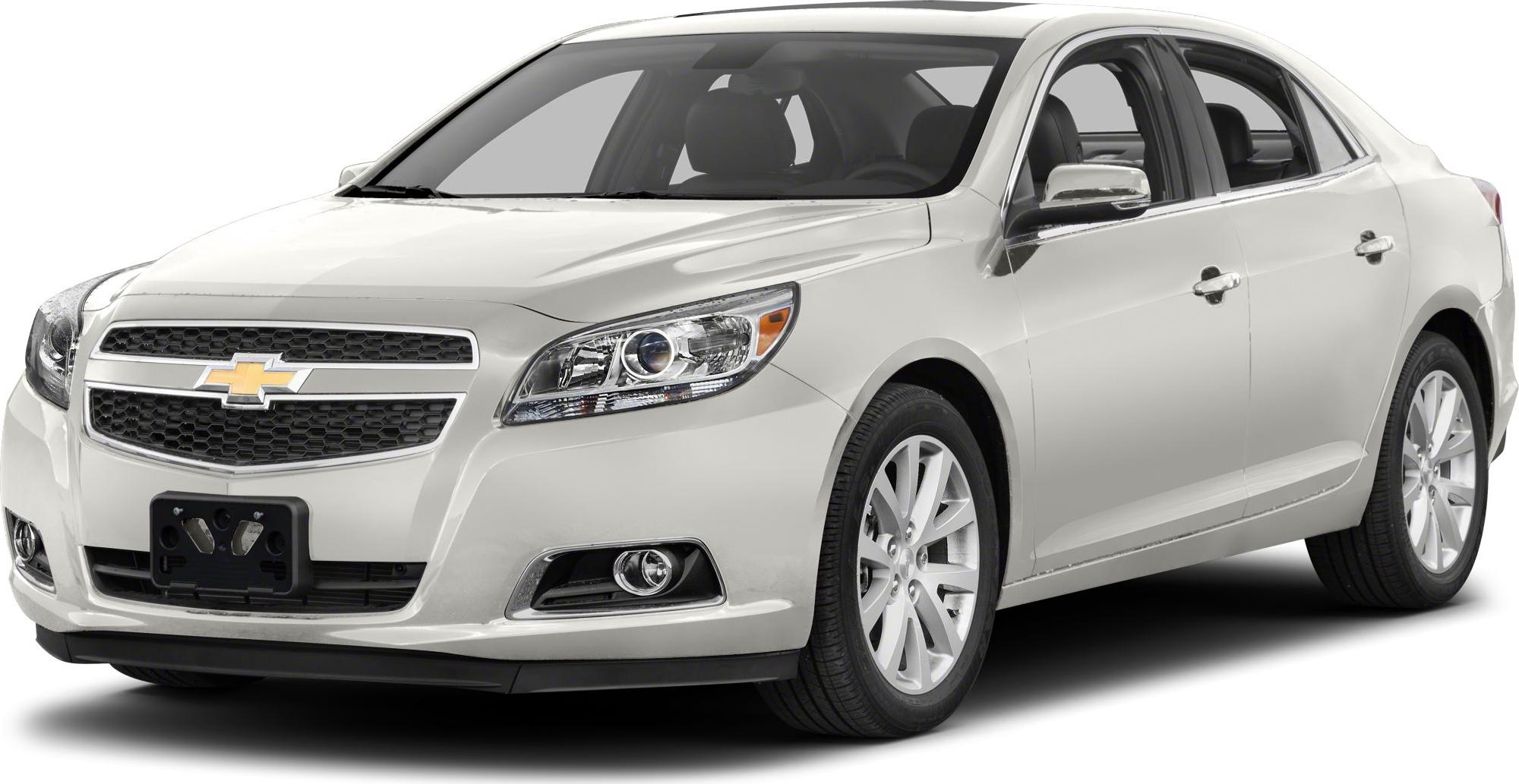 Front side view showing headlights, alloy wheels, fog lights, and sleek design.