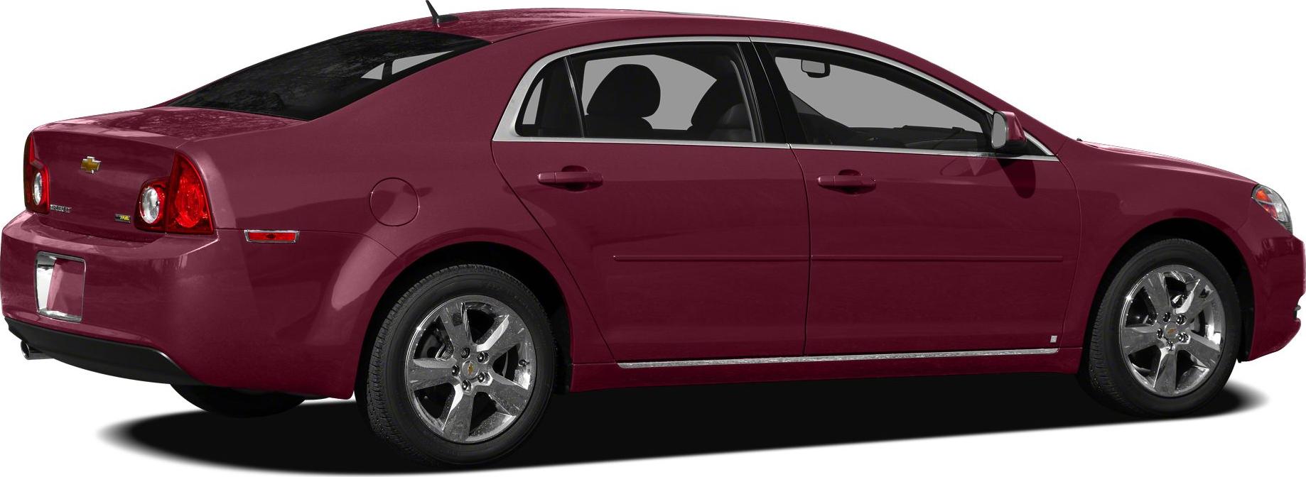 Side rear view of sedan with chrome wheels