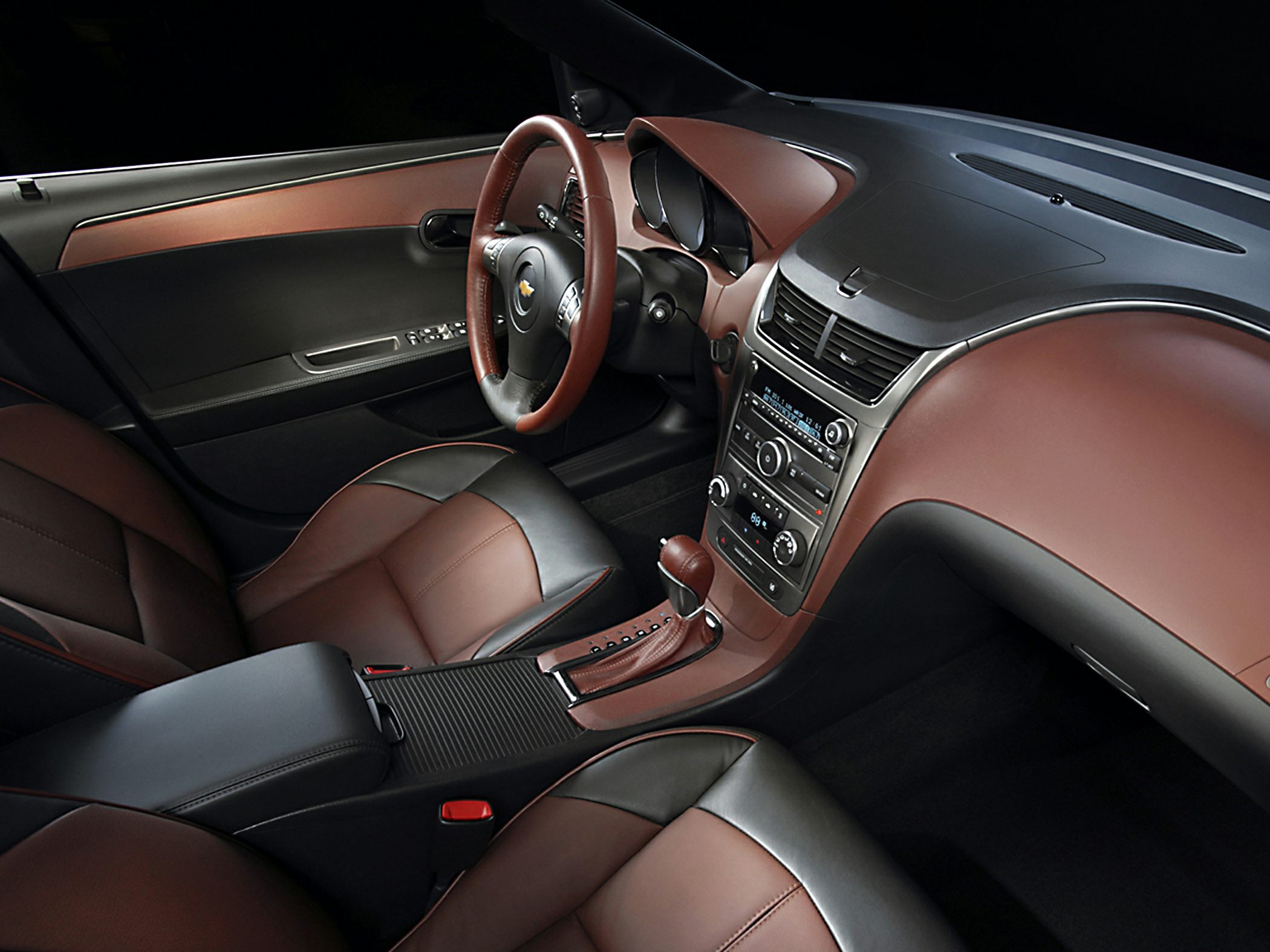 Dual-tone leather steering wheel and modern dashboard interior