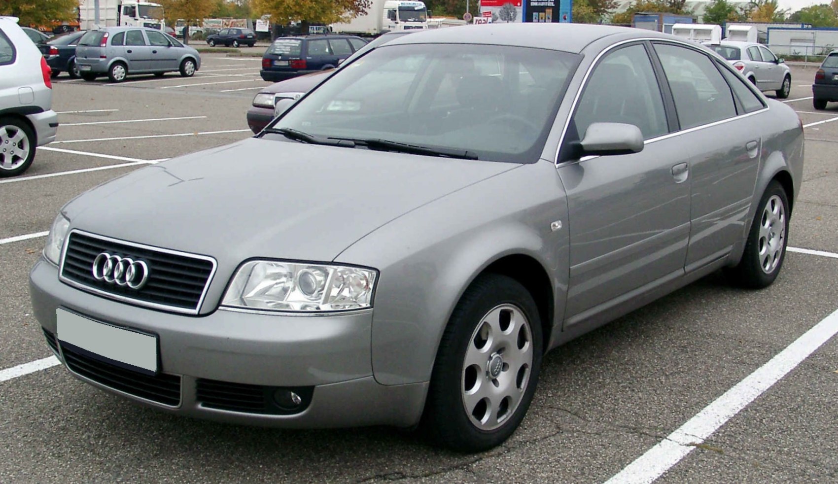 Front-side view of midsize sedan with facelifted headlights and grille