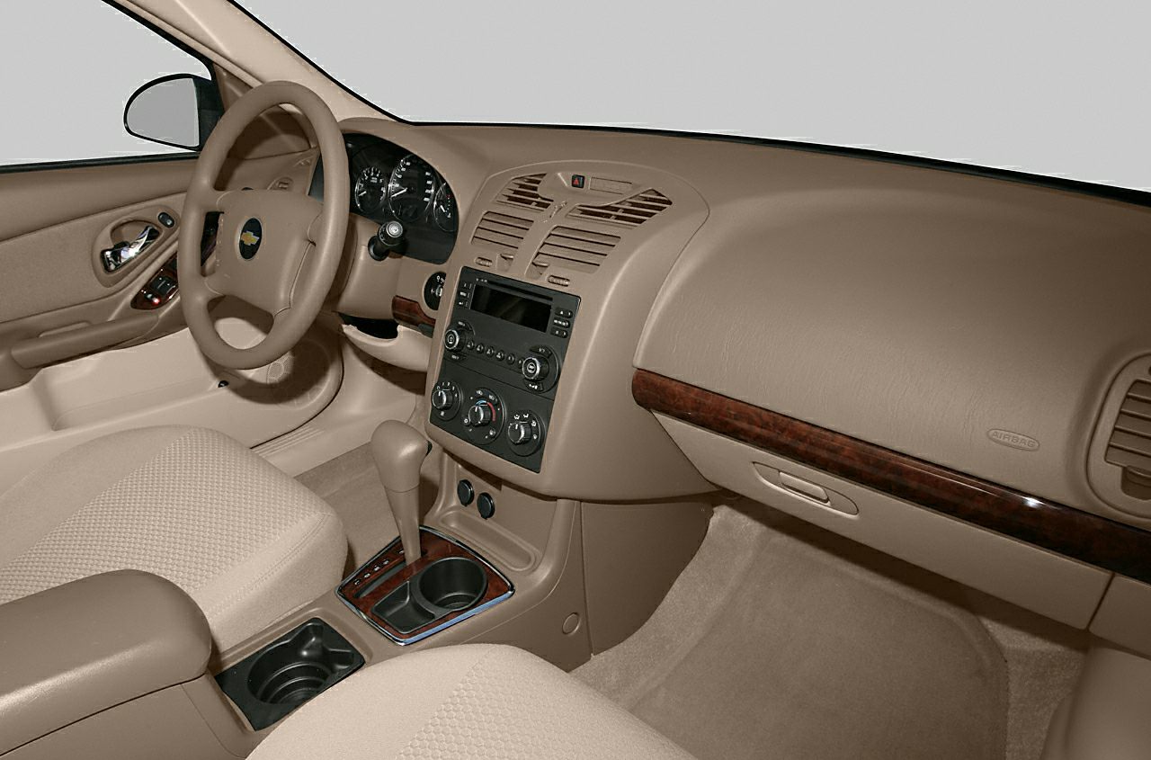 Beige interior dashboard and center console with steering wheel