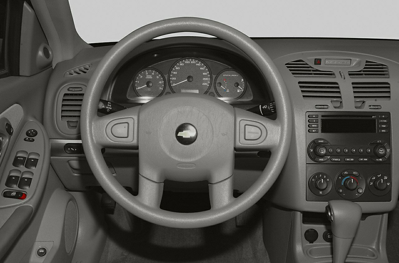 Dashboard, steering wheel, instrument panel, and center console controls