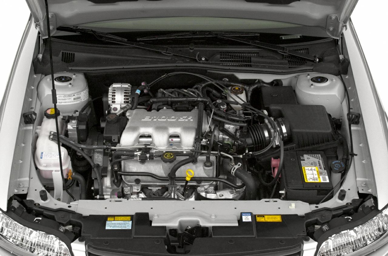 Fuel-injected 3100 SR engine with visible components and wiring in engine bay.