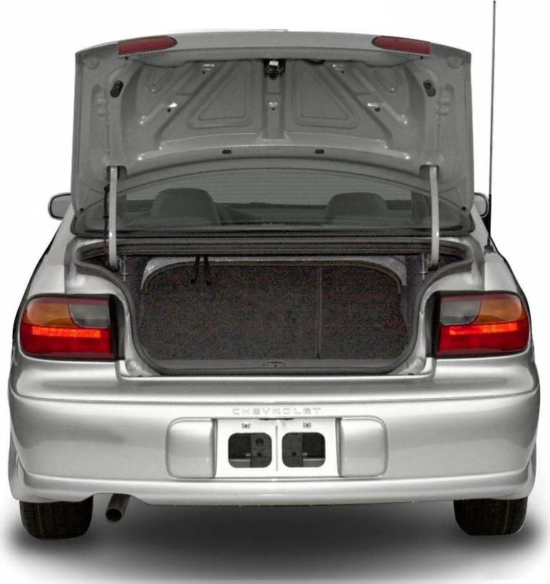 Rear view with open trunk and illuminated taillights