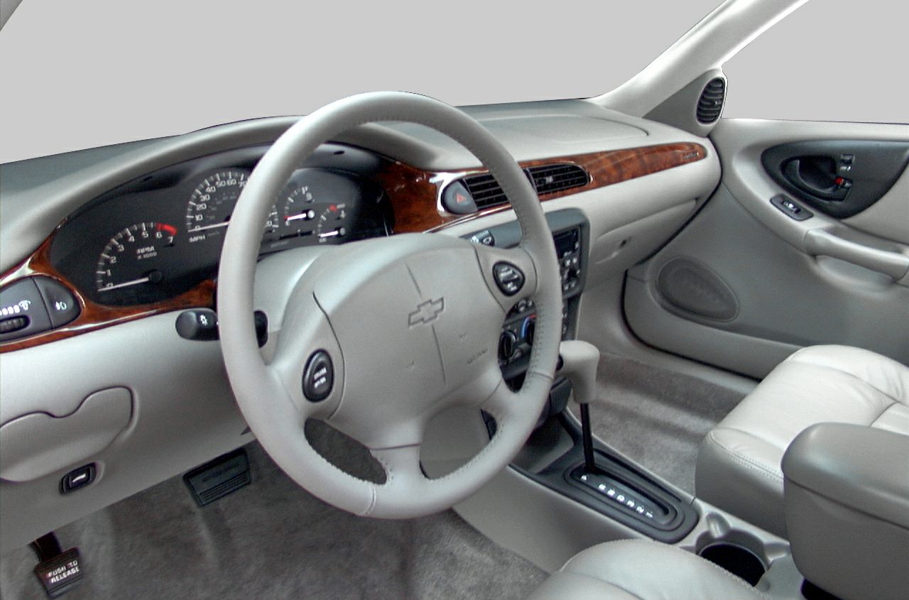 Dashboard and steering wheel with wood trim and automatic gear shift