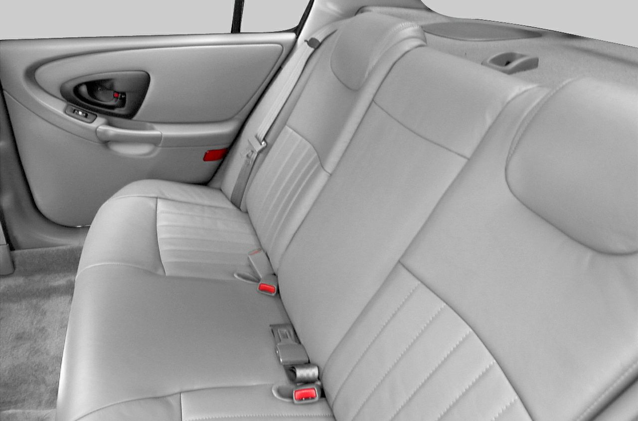 Rear seat interior with door panel and seatbelt details