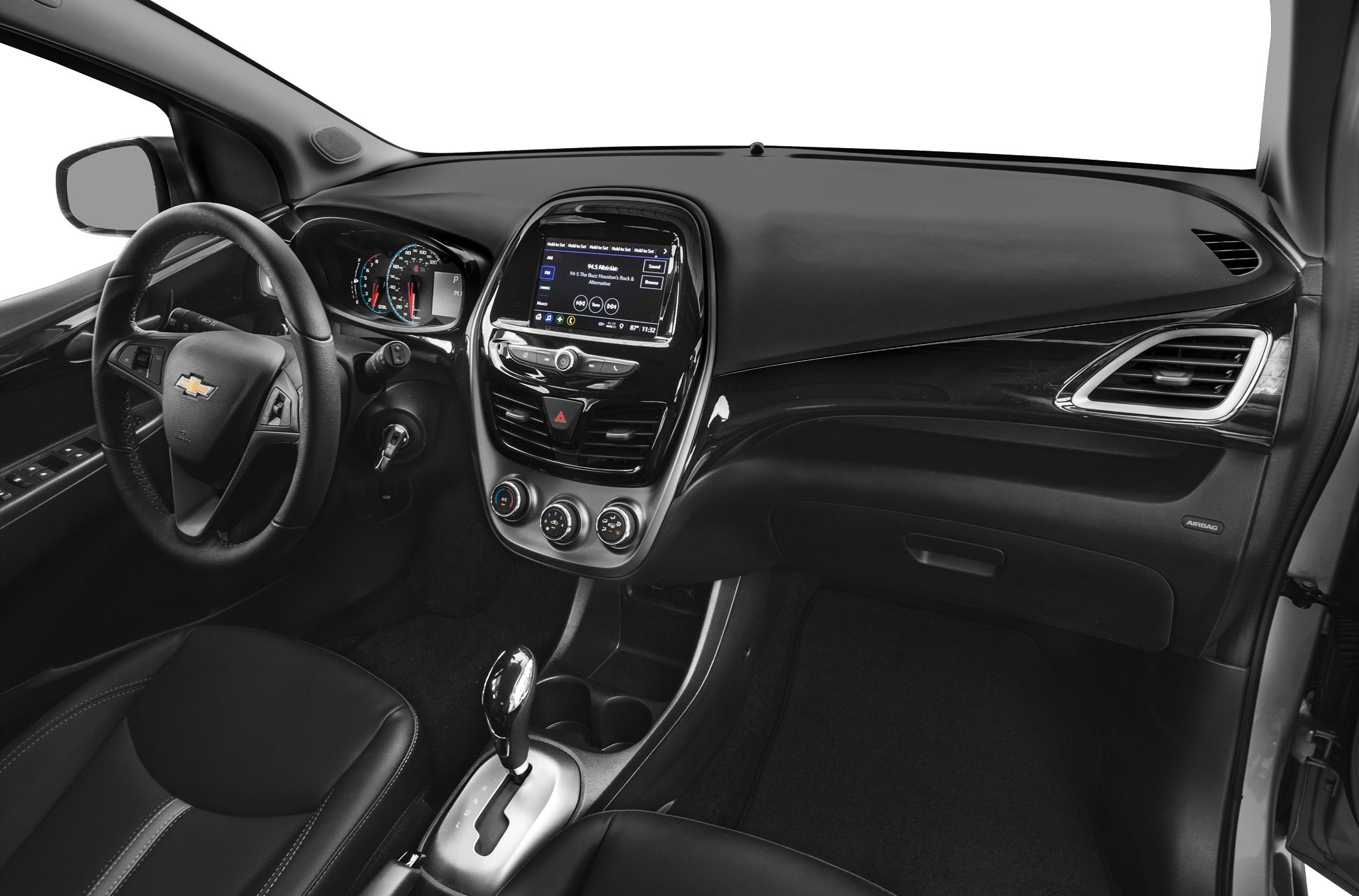 Front interior dashboard with infotainment and gear shift