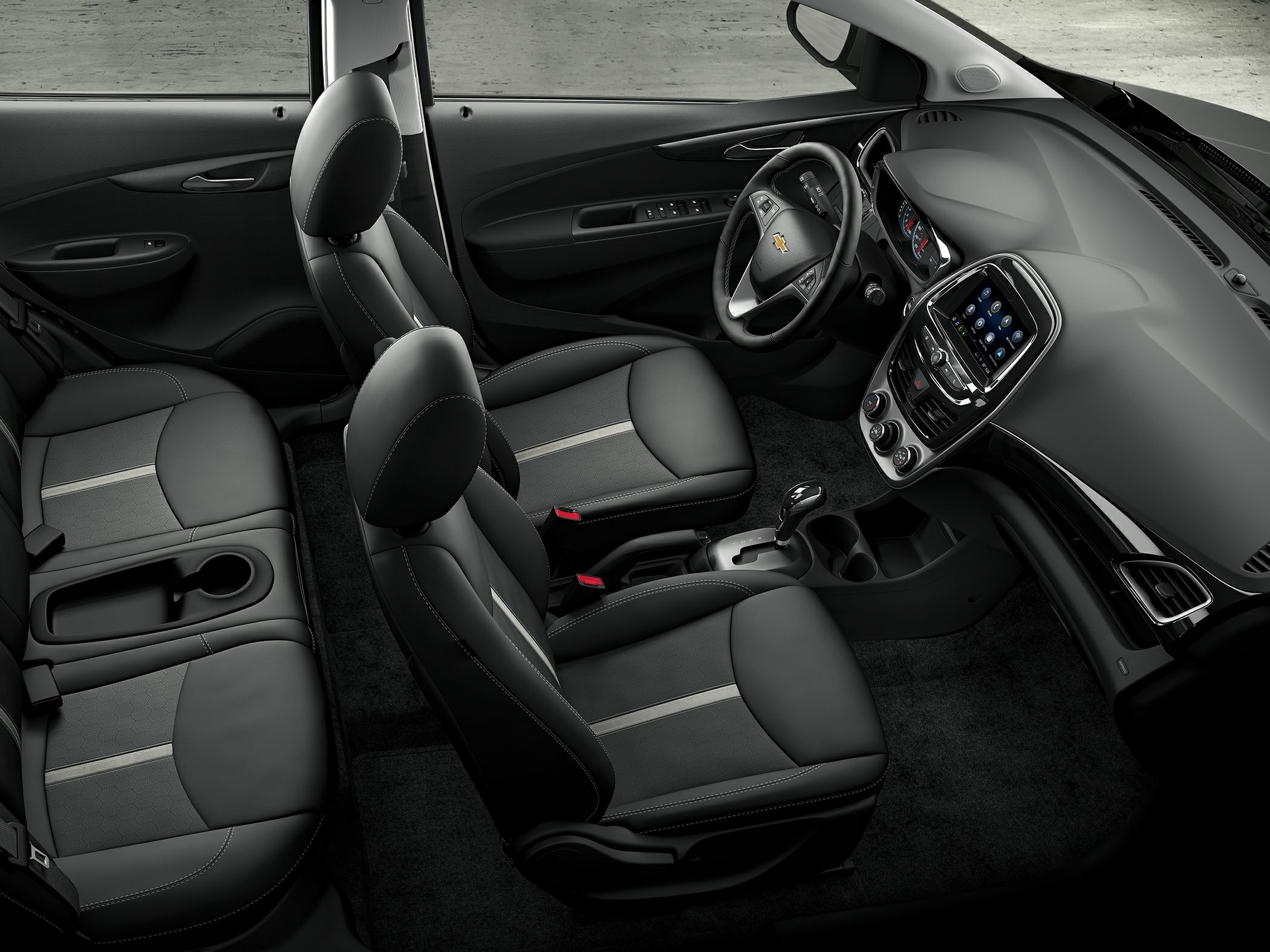 Modern car interior with touchscreen infotainment and automatic gear shift