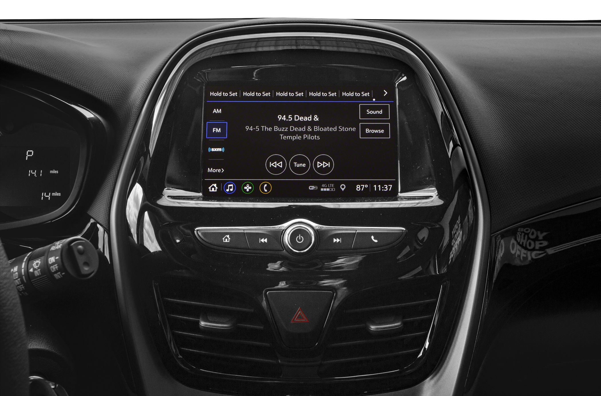 Central touchscreen infotainment and dashboard controls