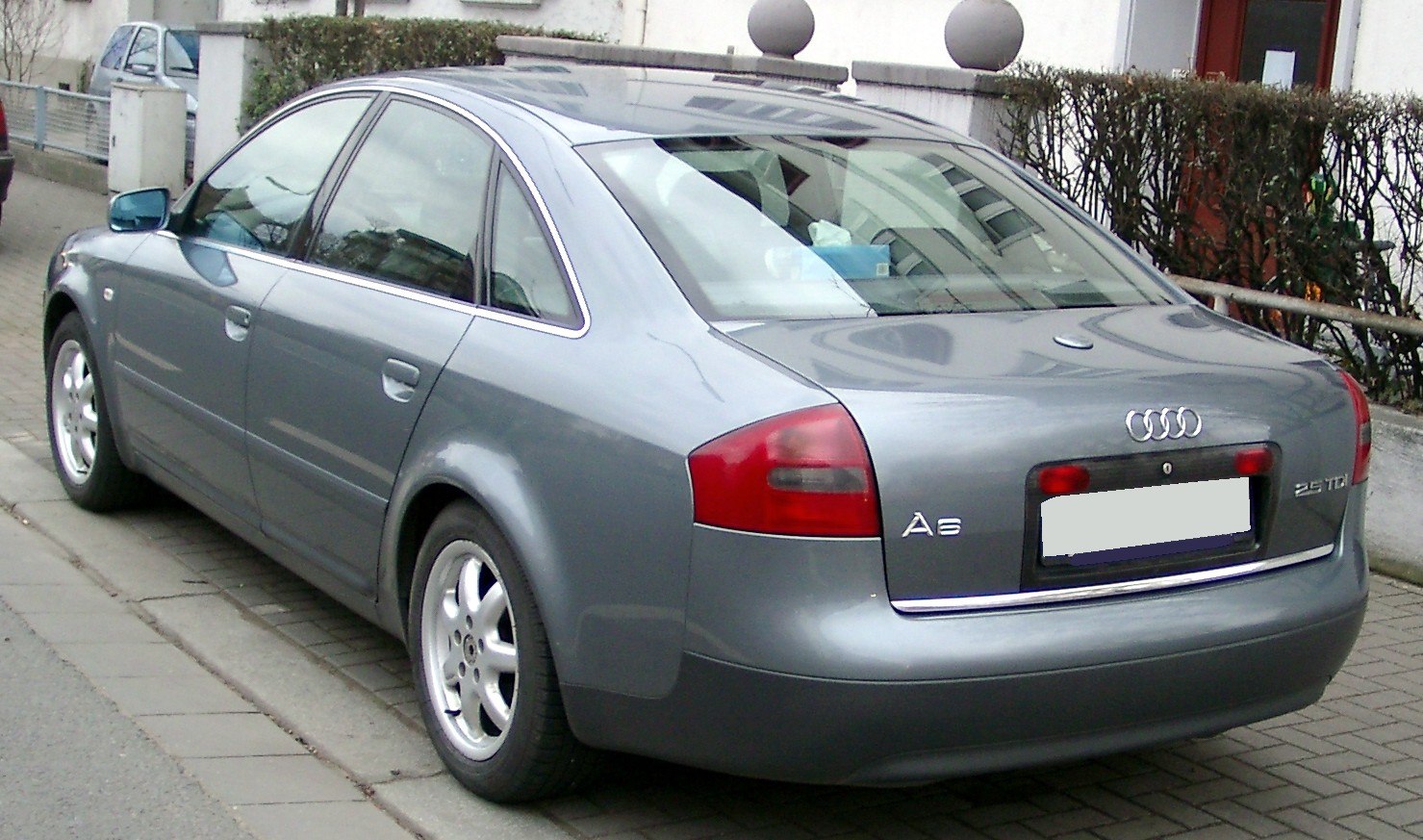 Rear view of a 1998 luxury sedan with sleek taillights and smooth body lines
