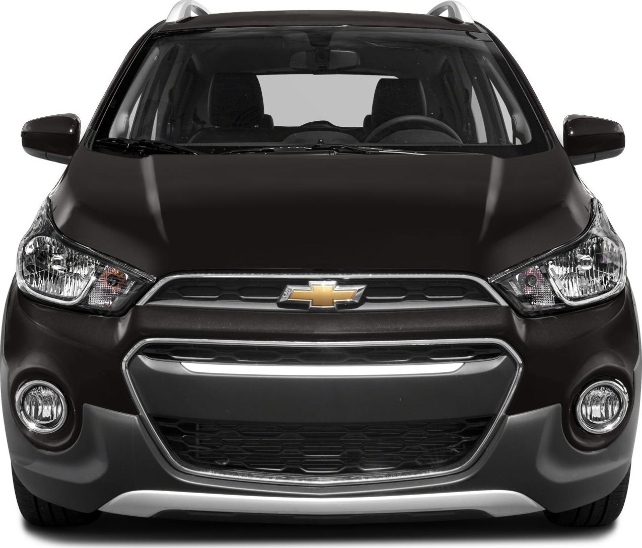 Front view featuring grille, headlights, fog lights, and roof rails.
