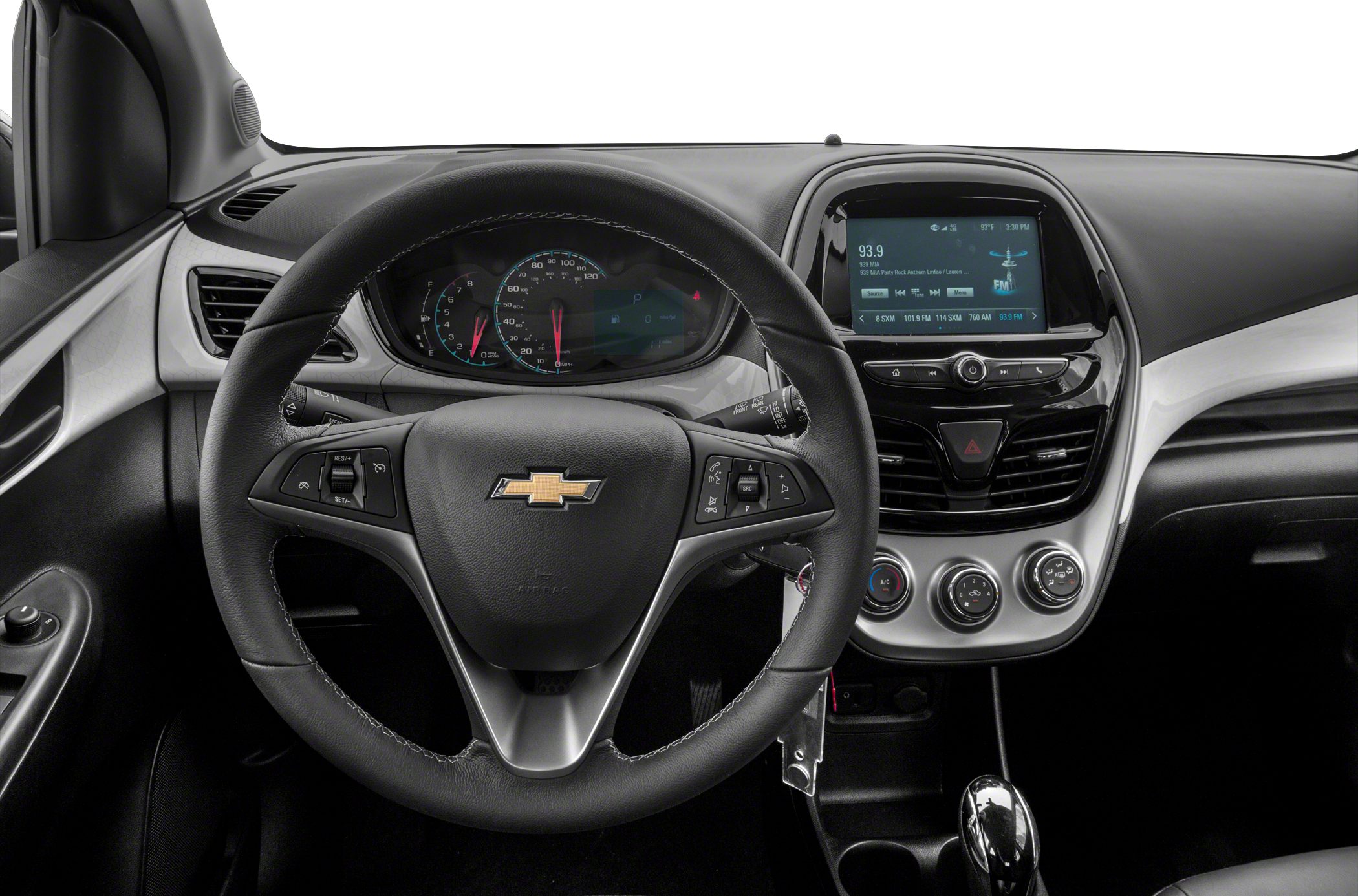 Dashboard and steering wheel with infotainment and manual climate controls