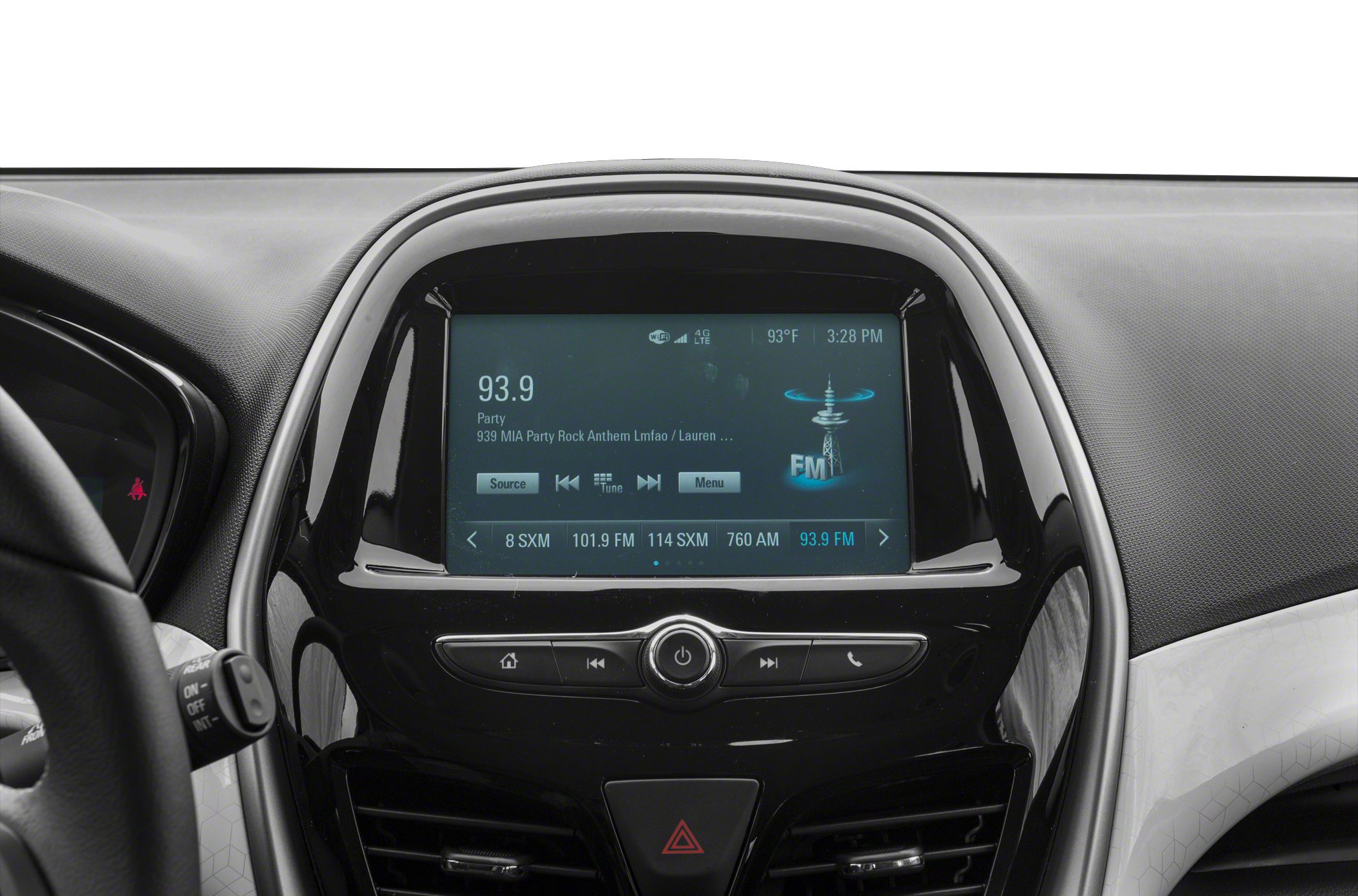 Infotainment touchscreen with media controls and dashboard vents