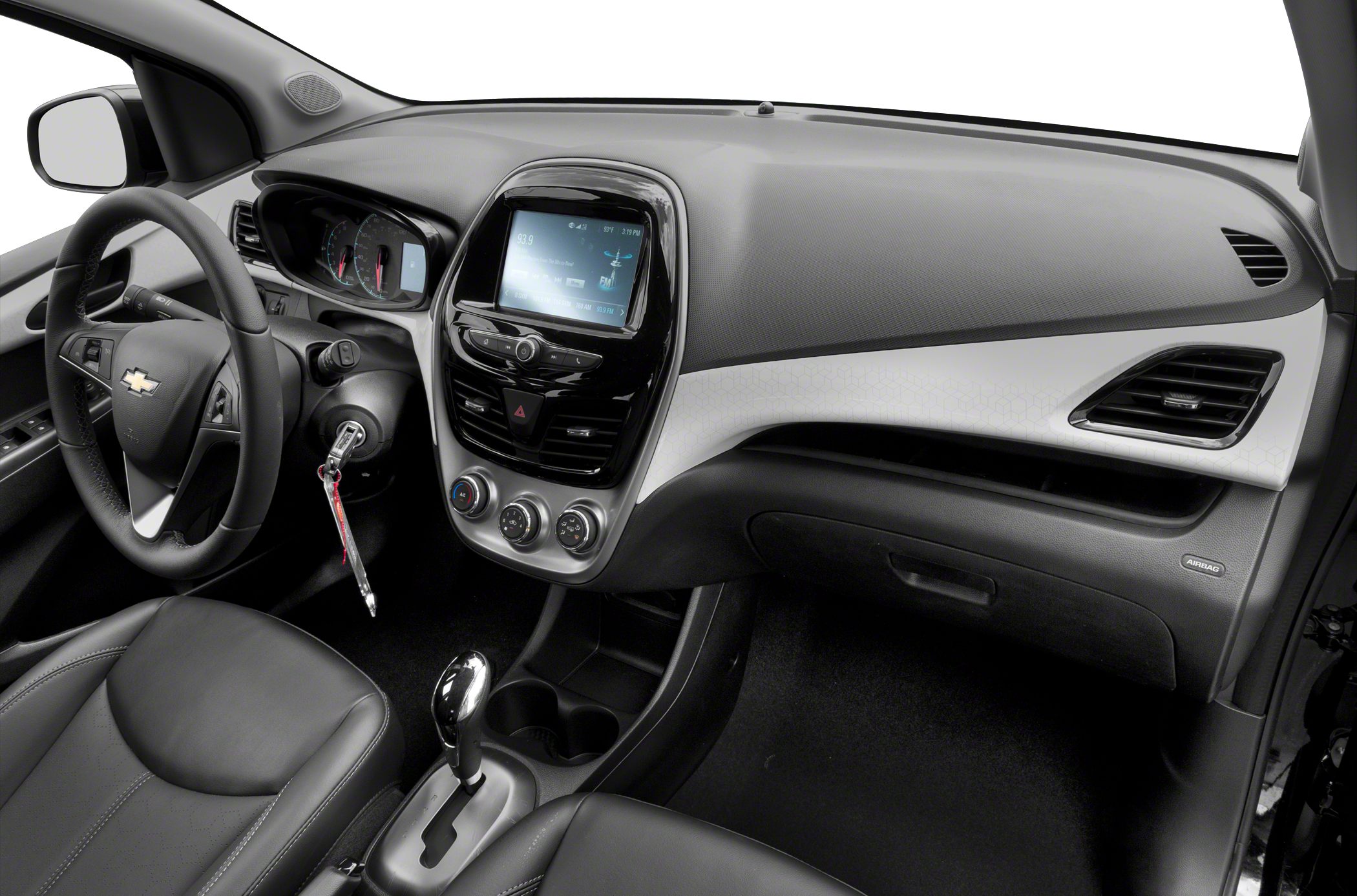 Dashboard, central touchscreen, steering wheel, gear shift