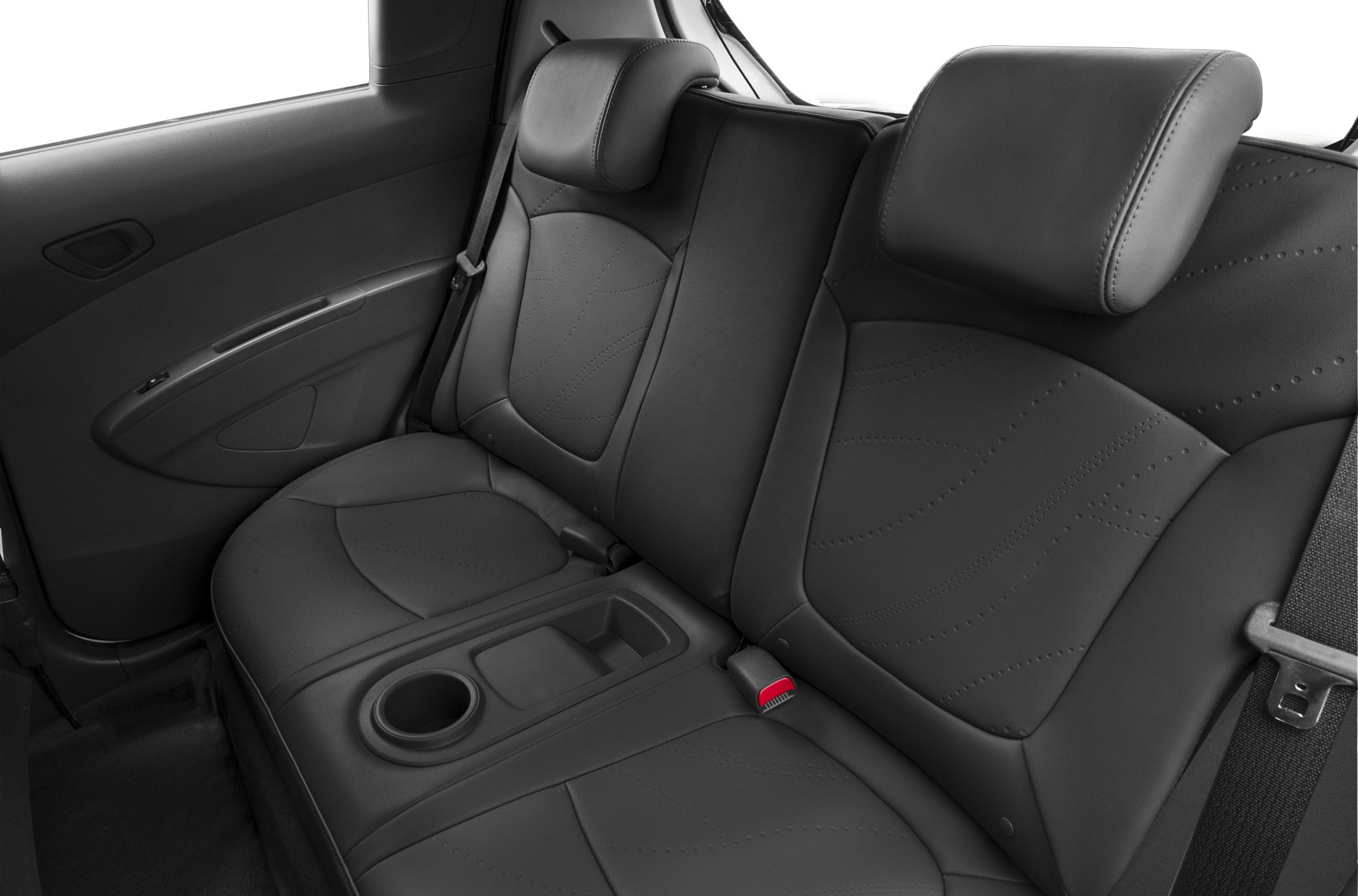 Rear seat interior with leather upholstery, armrest, and cup holder