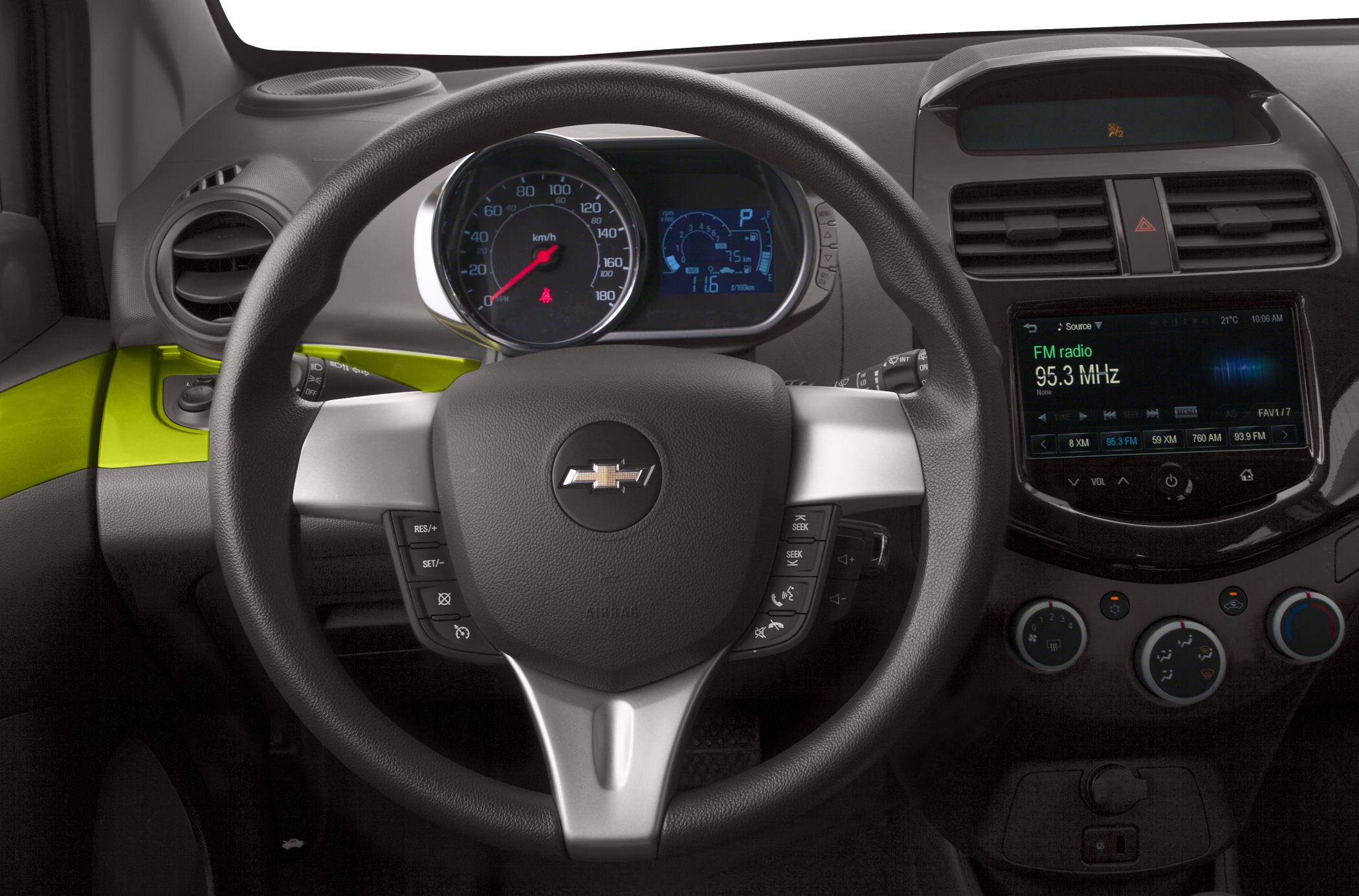 Steering wheel with controls, digital instrument cluster, infotainment system