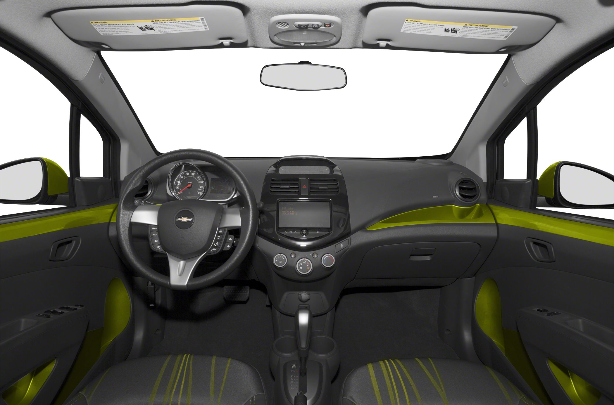 Car interior with dashboard, steering wheel, and central console.