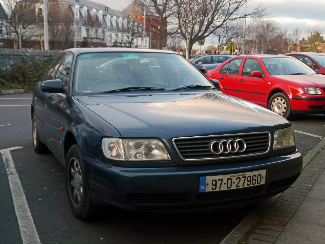 Front view of classic sedan with boxy headlights and iconic grille