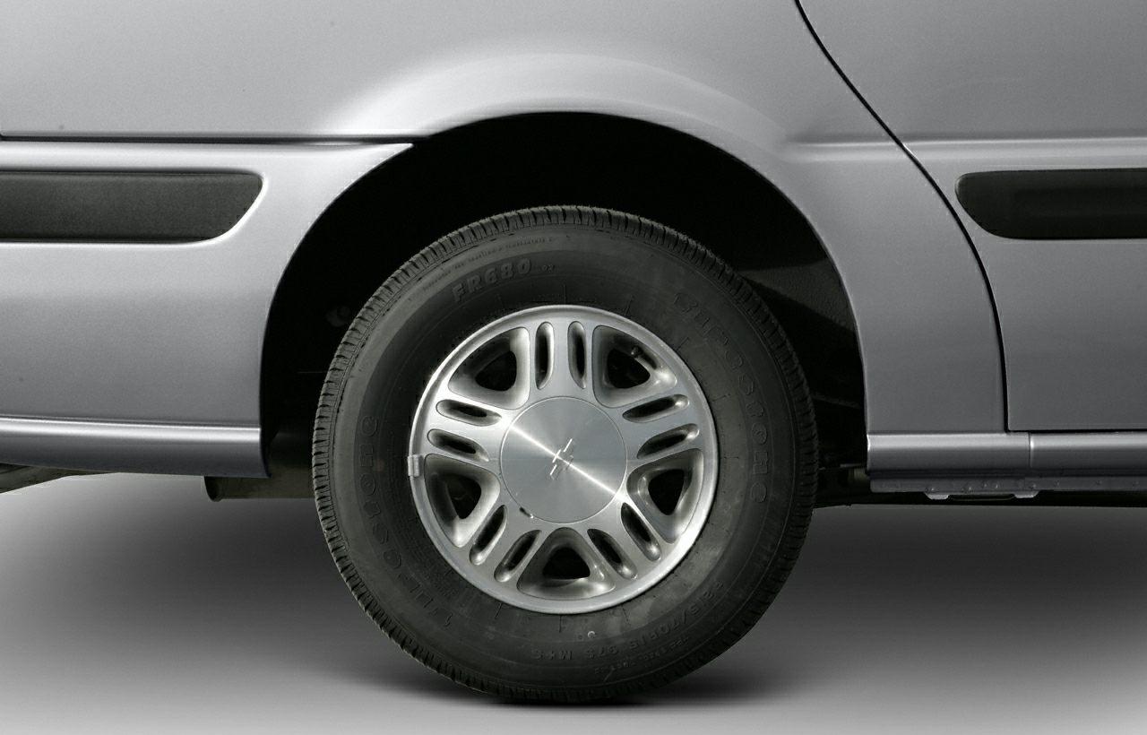 Close-up of a car's wheel and tire on a silver body