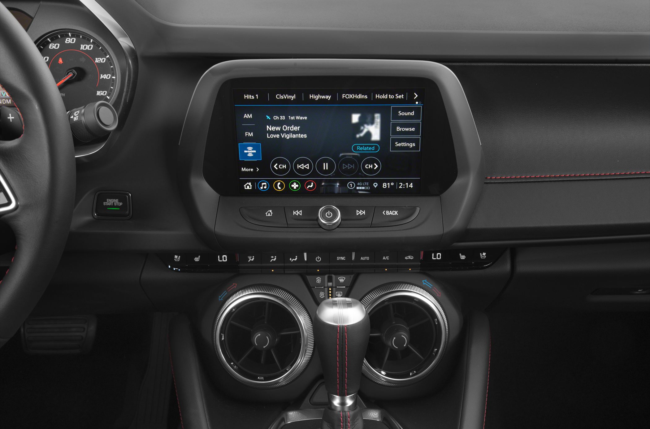 Modern dashboard with digital infotainment and dual circular air vents