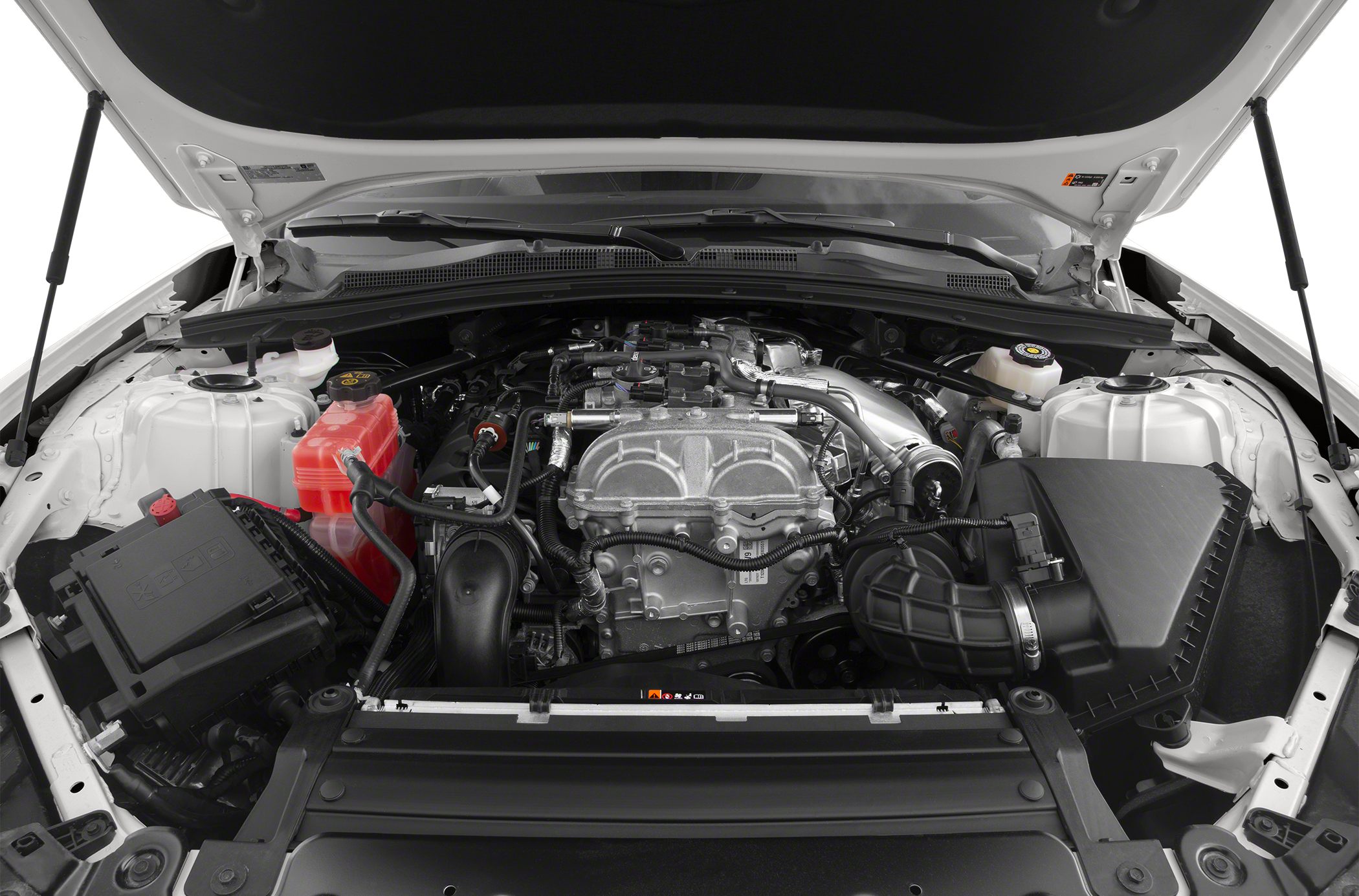 Open engine bay showing detailed muscle car powertrain and components