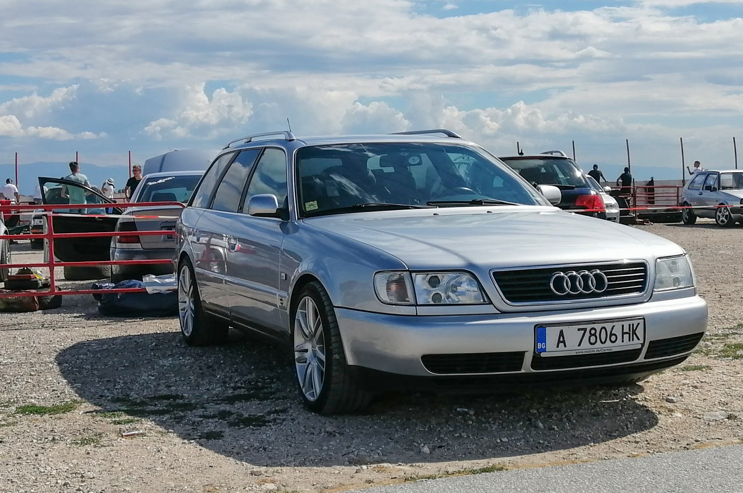 Silver station wagon with roof rails and alloy wheels